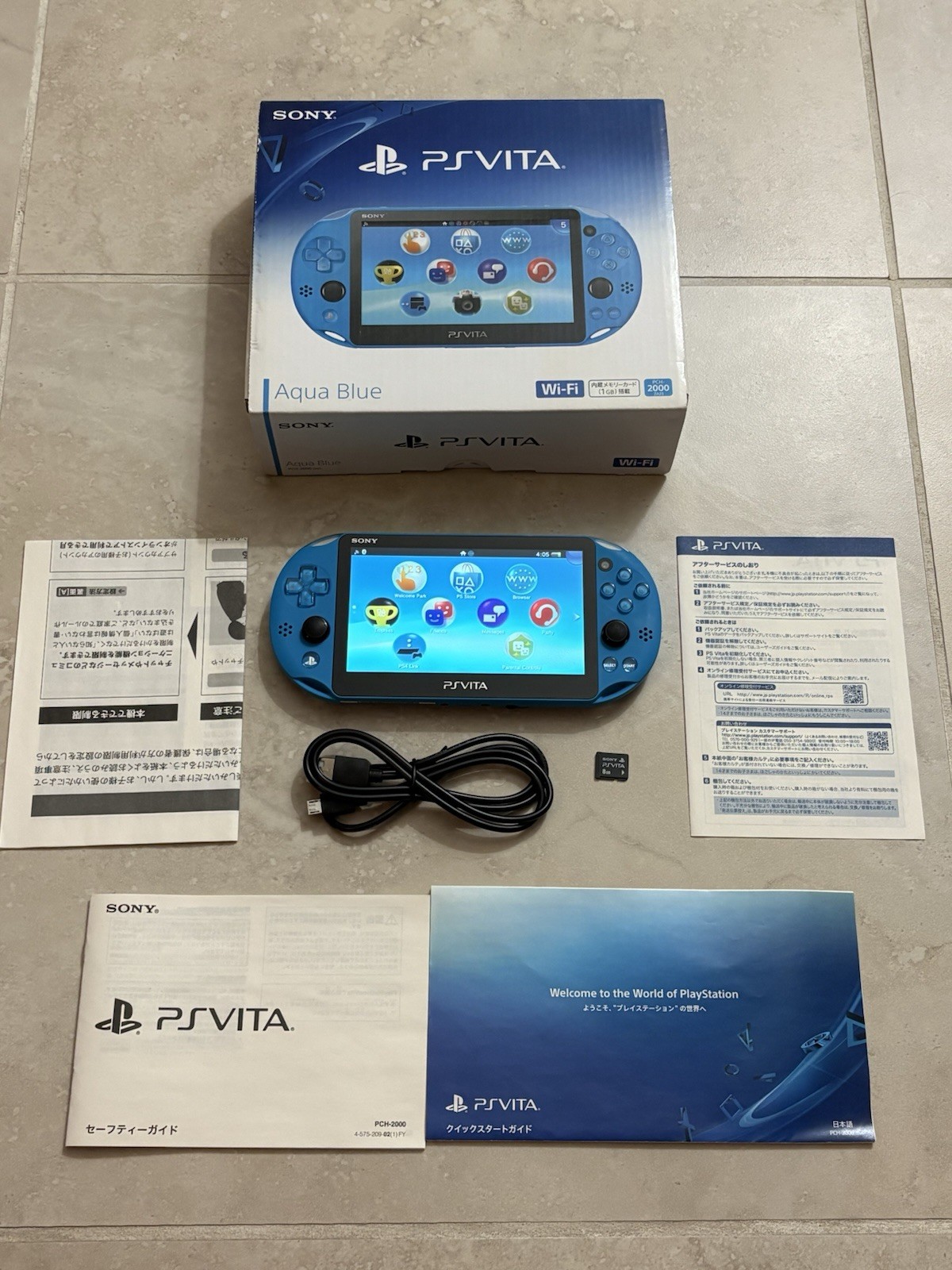 Sony PS Vita PCH-2000 Complete In Box – Aqua Blue 8GB Very Good Condition