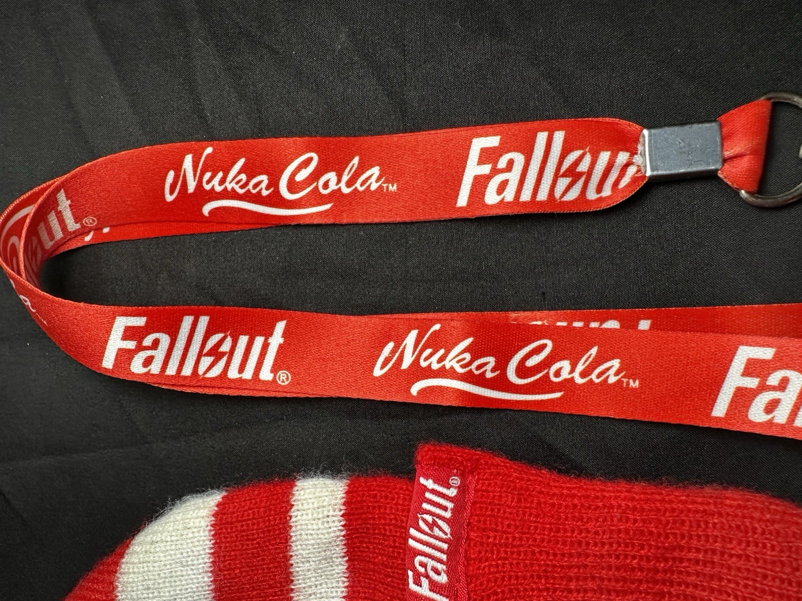 Lot of Bethesda Fallout Nuka Cola Bottle Caps, Beanie Hat, Lanyard & Keychain