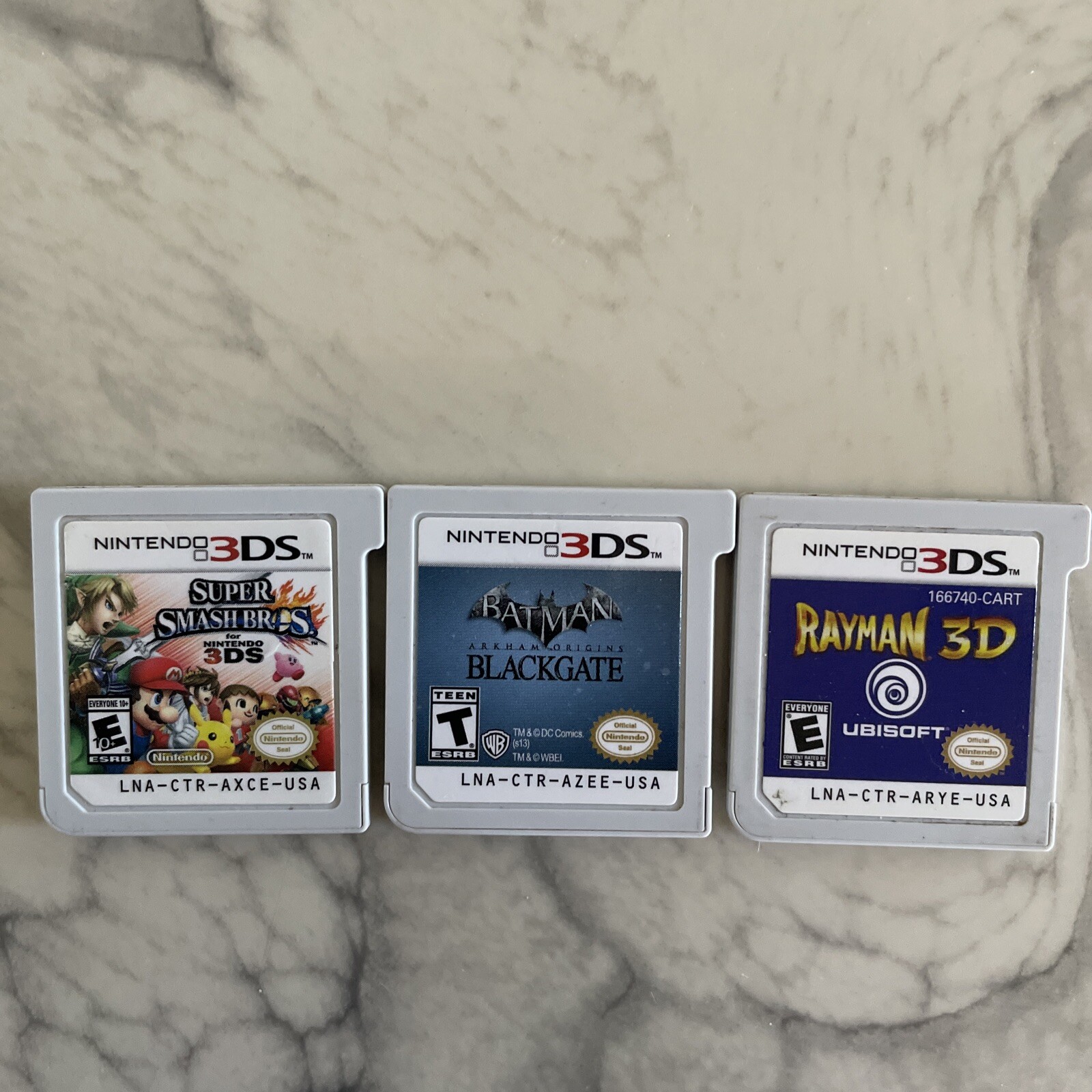 Lot 3 Nintendo 3DS Games Super Smash Bro, Rayman 3D, Batman Blackgate Cartridges