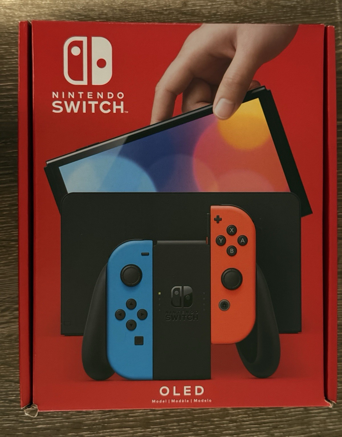 Nintendo Switch OLED (Barely used Console Neon red/blue Joy-Con, original pack)