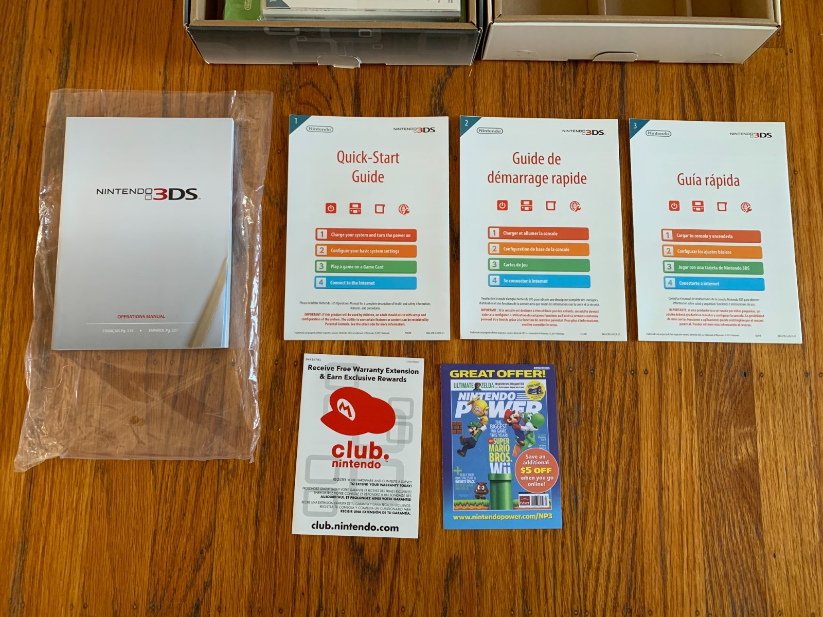 Lot of 2 Nintendo 3DS Cosmo Black and Flame Red console boxes and manuals only