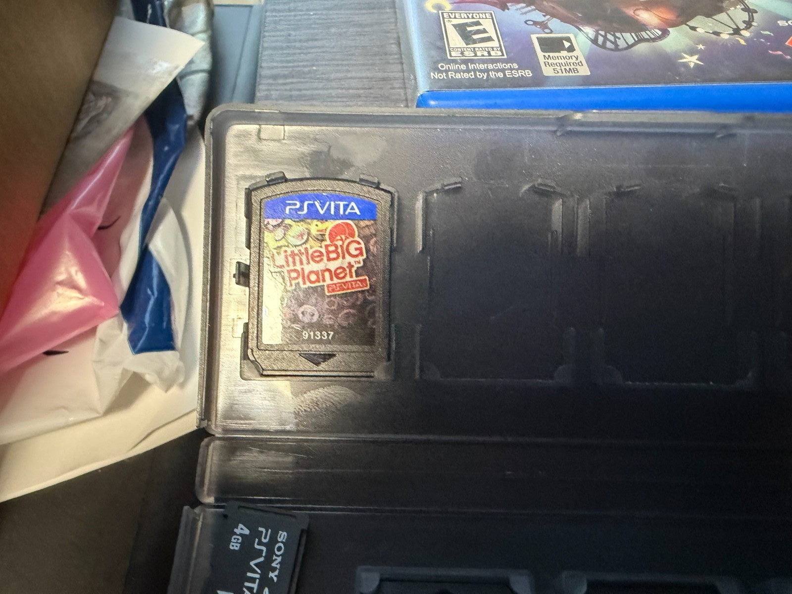 Sony PS Vita PCH-2001 Black Complete Bundle – Games, Memory Cards, Carrying Case