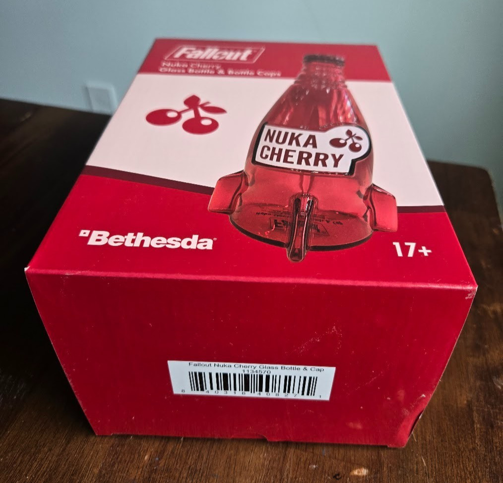 Fallout Nuka Cola Cherry Glass Rocket Bottle & 10 Bottle Caps NEW
