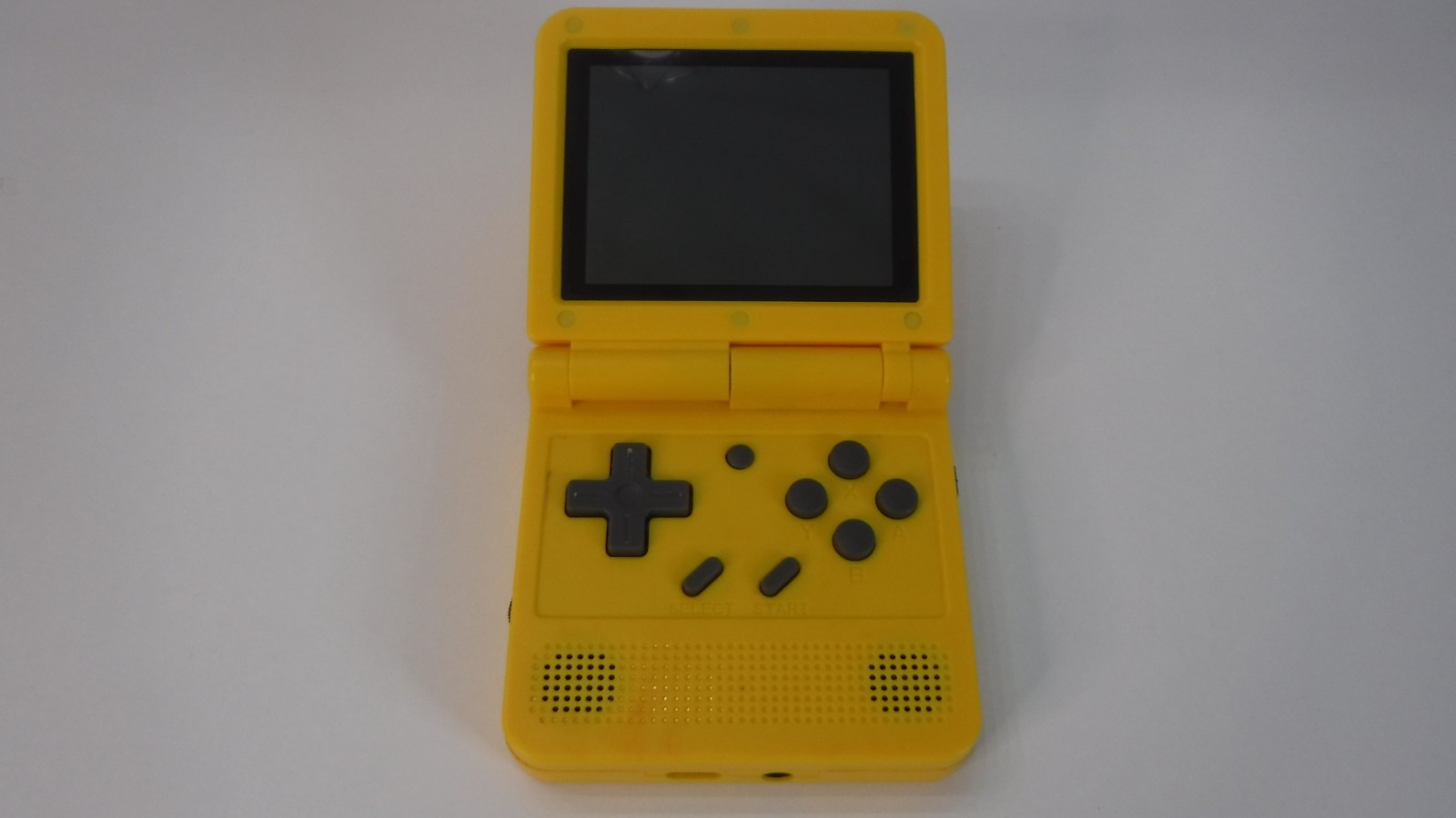 Powkiddy V90 3.5 Inch Foldable Retro Flip Handheld Game Console running Miyoo