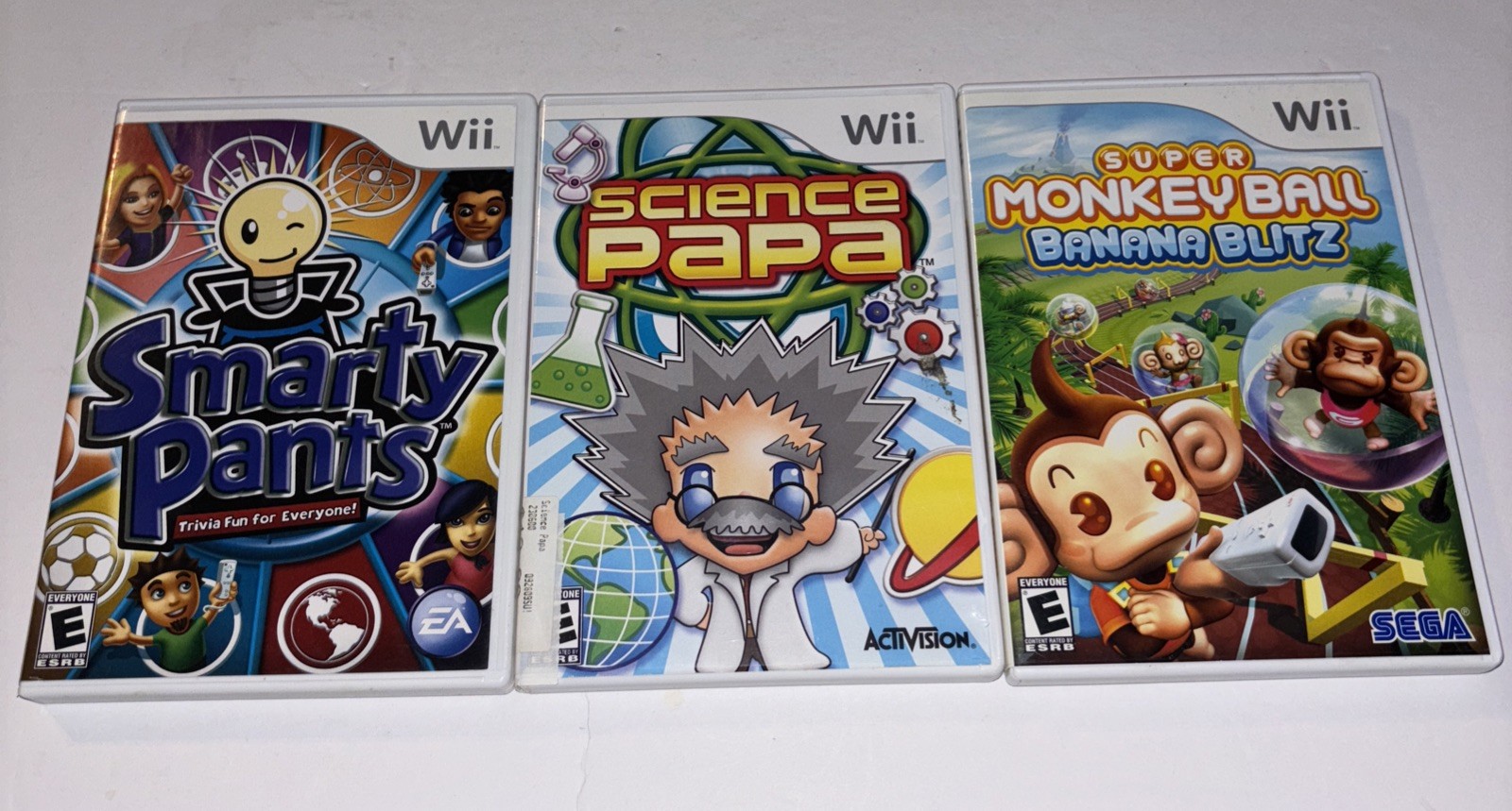 Lot 0f 3 Wii Games Smarty Pants Science Papa Super Monkey Ball Banana Blitz