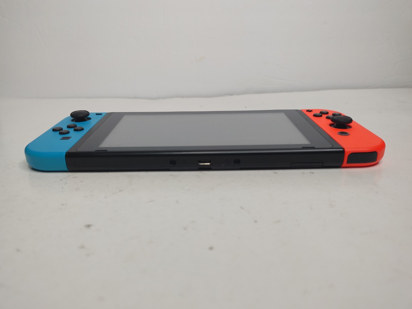 Nintendo Switch HAC-001 Console w/ Dock, Red/Blue Joy-Con