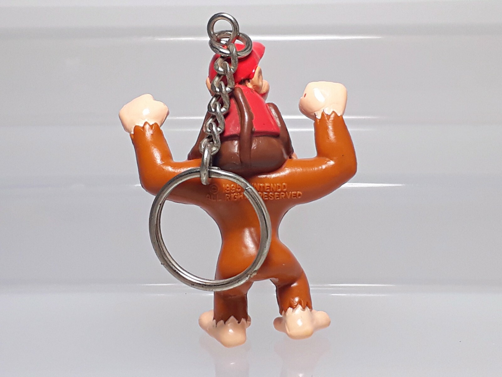 Diddy riding Donkey Kong Country Rumble in the Jungle Figure Keychain 1995 2.4in