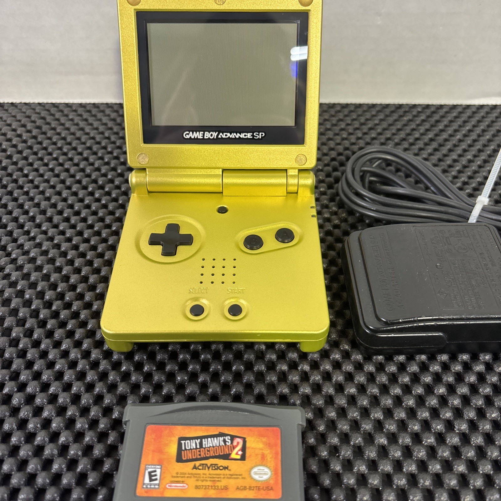 Nintendo Game Boy Advance SP Gold w/Tony Hawk’s Underground 2 OEM Charger