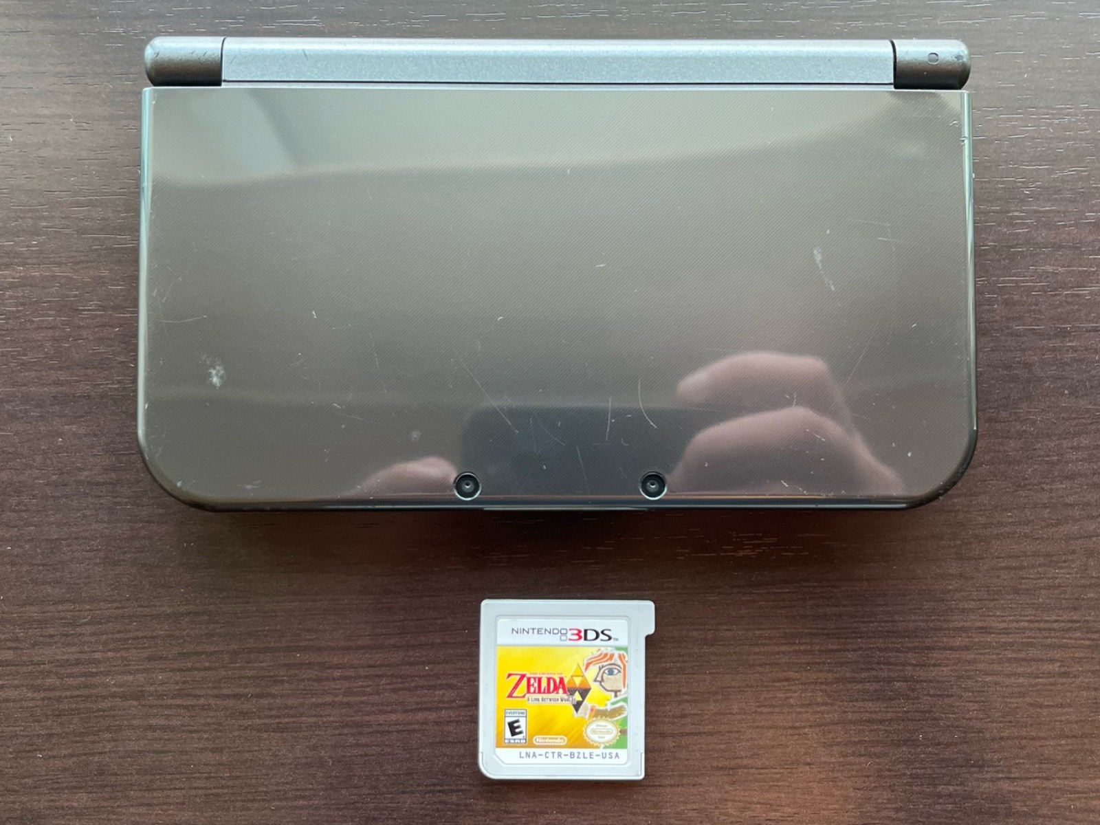 Nintendo New 3DS XL, includes Zelda Link Between Worlds, Some Flaws Scratches