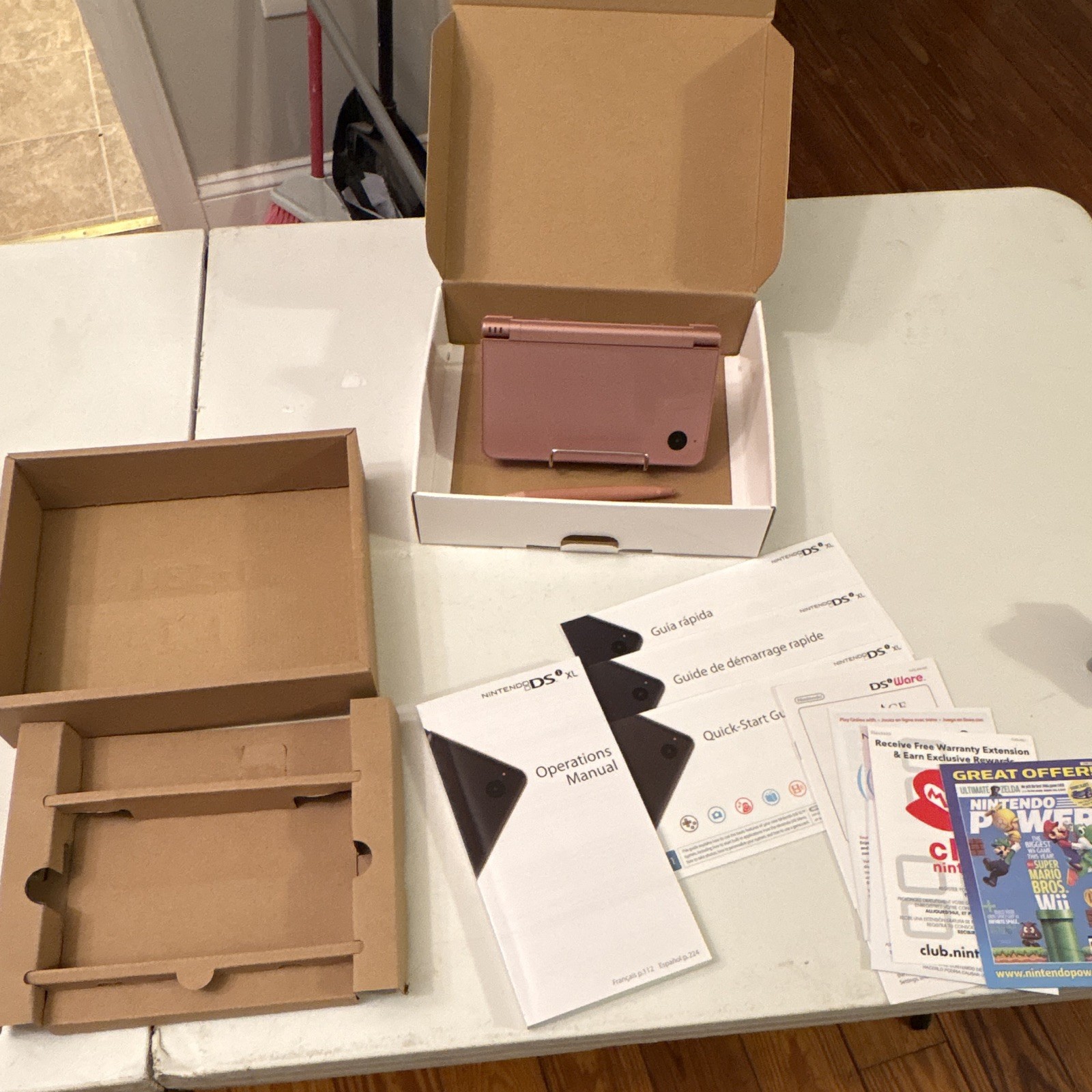 Nintendo DSi XL Metallic rose Handheld System NTSC-U/C w/ Box Stylus Manuals