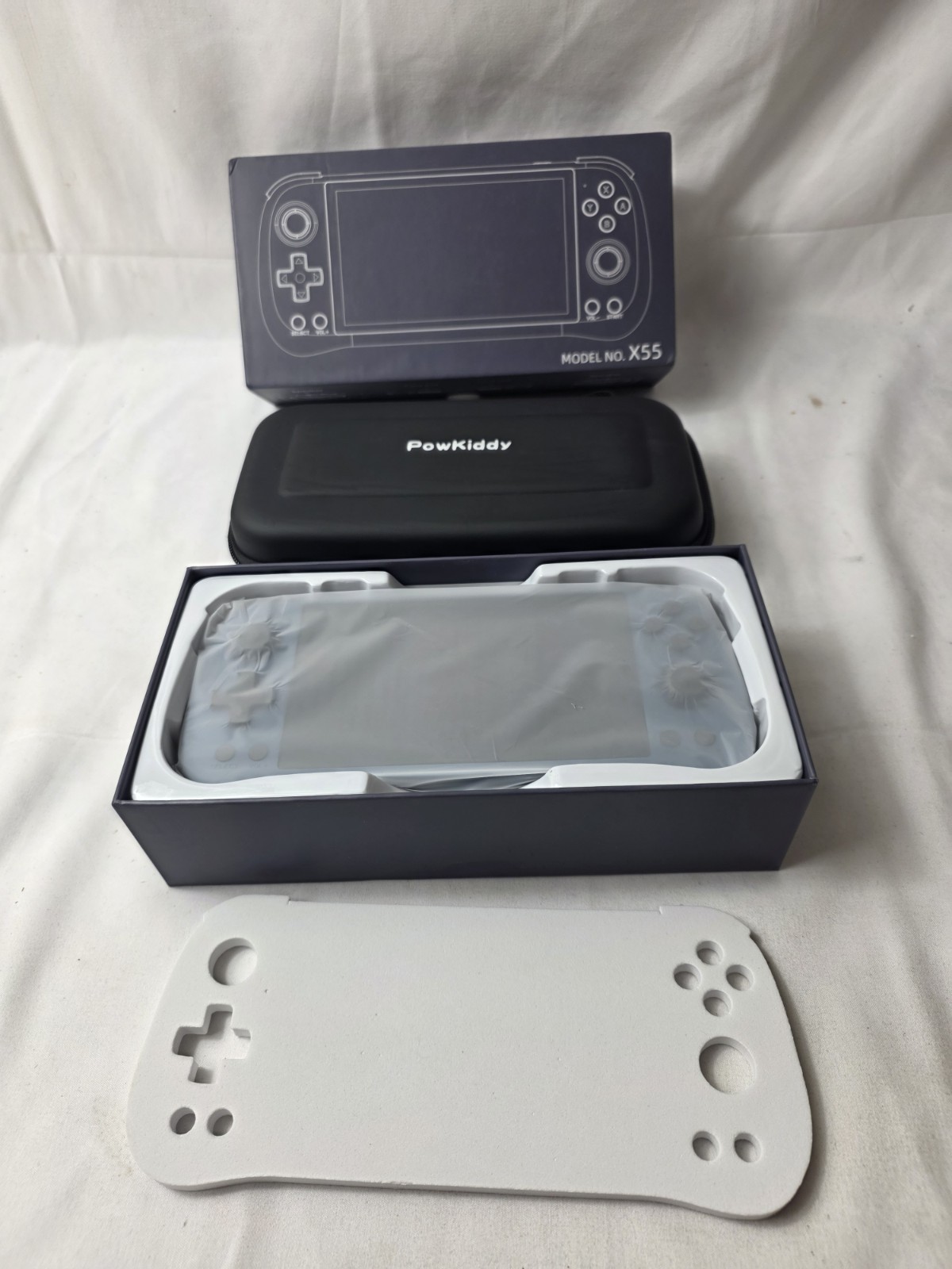 New Powkiddy X55 Portable gaming handheld 5.5″ IPS Screen With Games