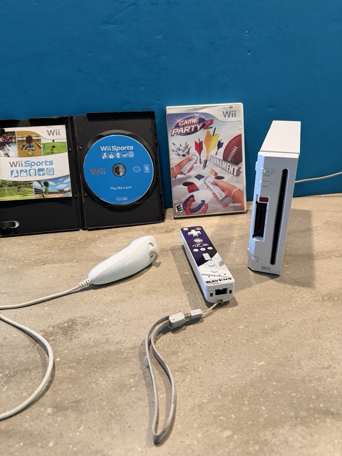 Original Nintendo Wii Bundle- Consol, Wii Sports, Game Party 2, And Controllers.