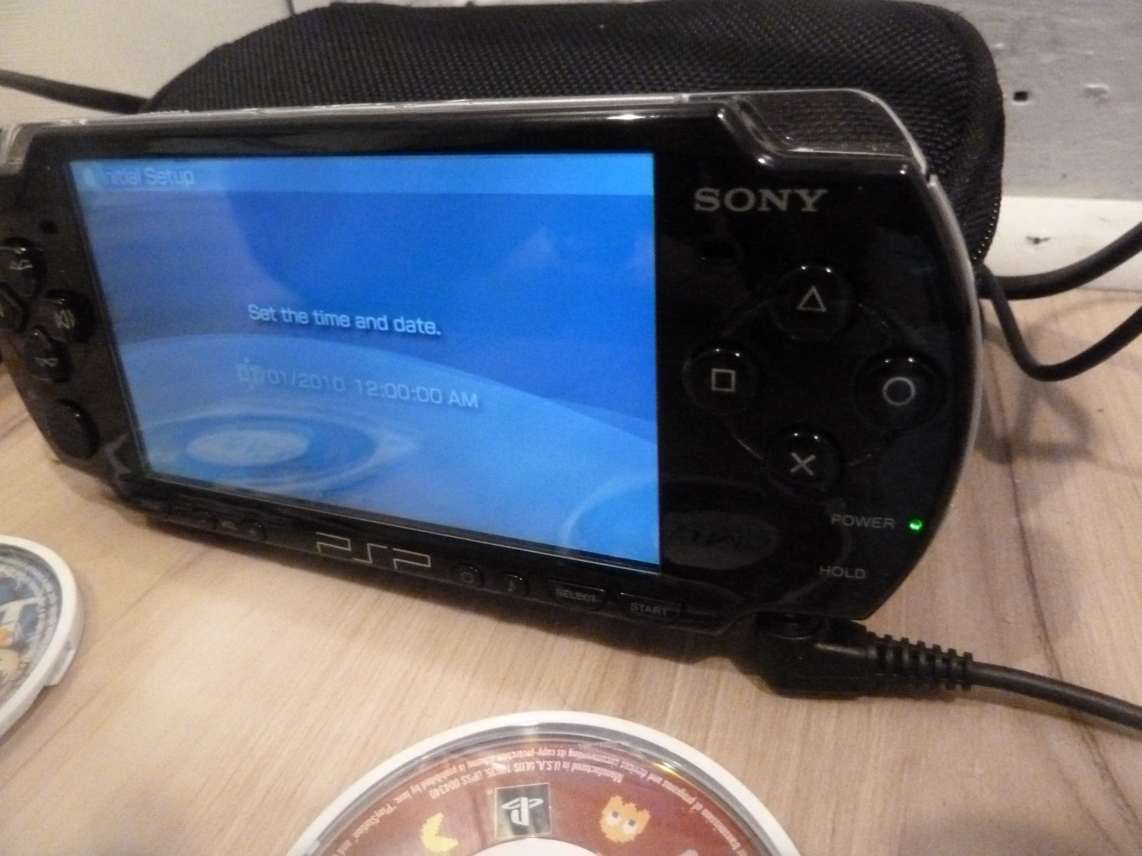 Sony PSP 2001 Black Console + battery, charger, games, carrying case PLEASE READ