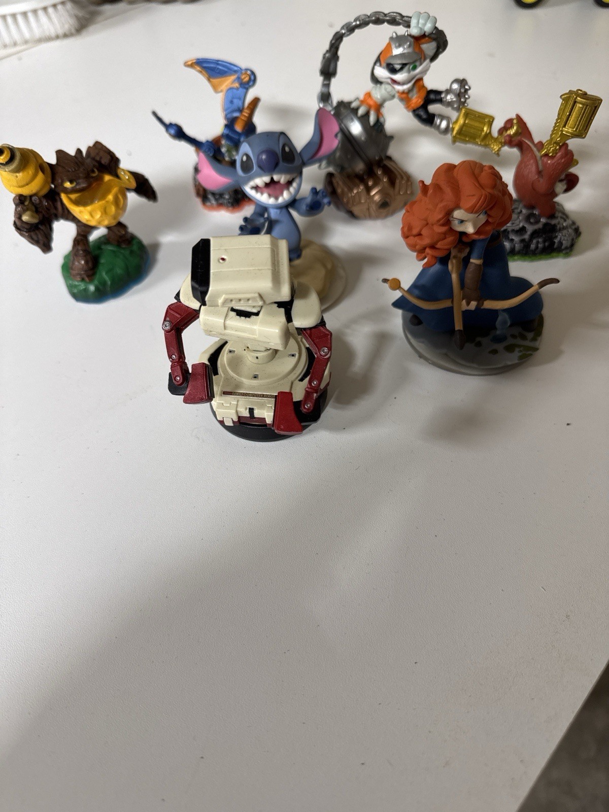 Disney Infinity & Skylanders Figure Lot WALL-E Stitch Merida Trigger Happy