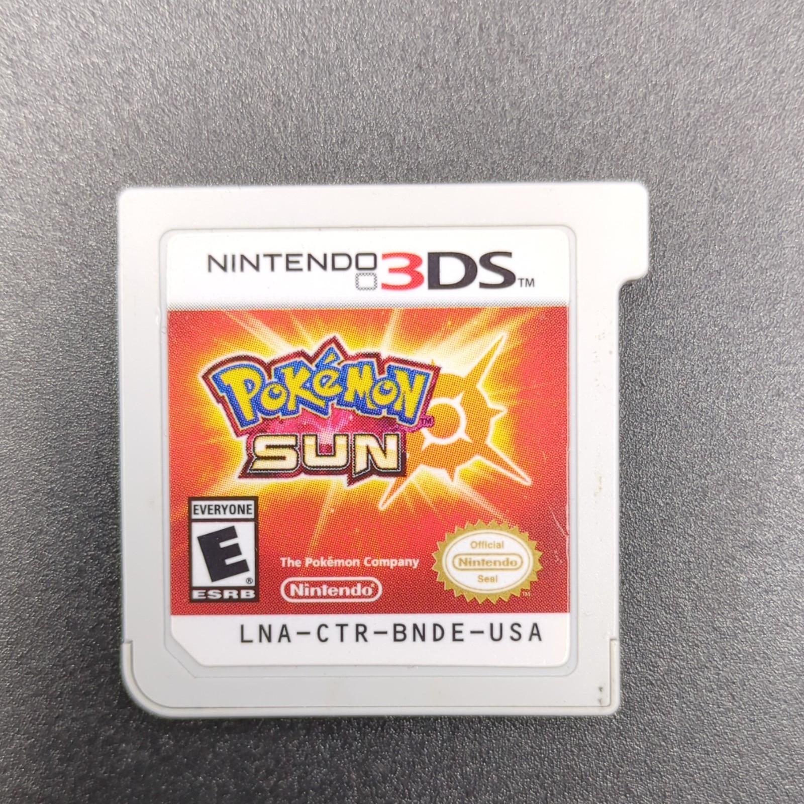 Nintendo New 3DS XL Red Console Bundle w/ Pokemon Platinum, Sun, X, Omega Ruby