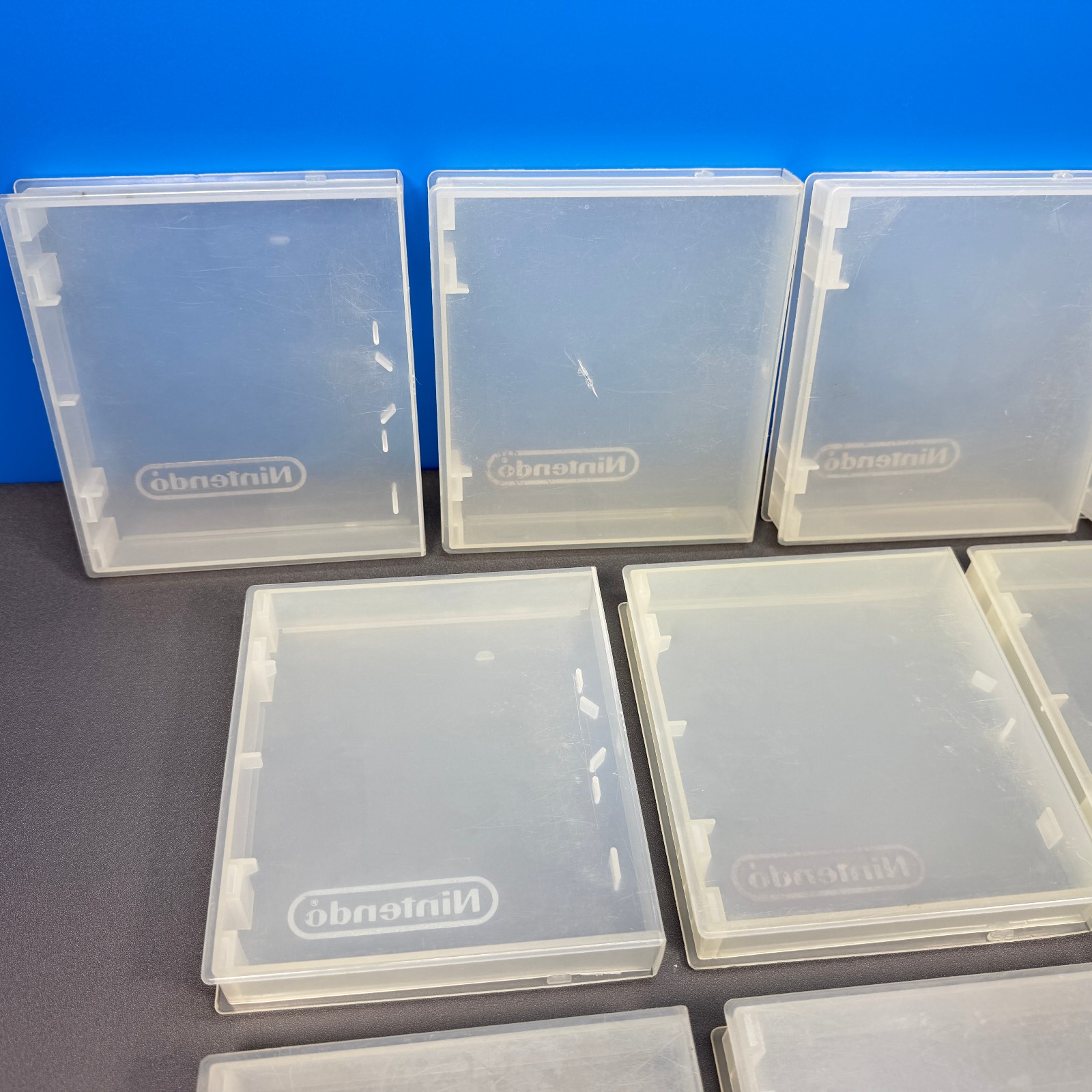 LOT OF 10 NINTENDO NES GAME HARD PLASTIC CLAMSHELL CASE CASES CLEAR RED LOGO OEM