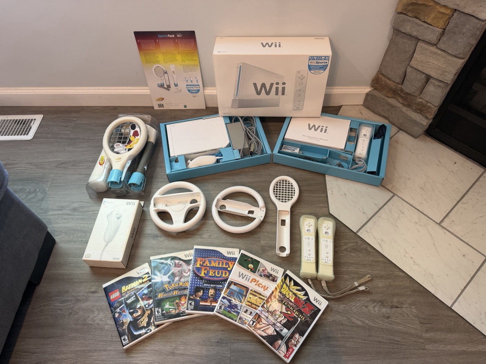 Nintendo Wii Console Bundle – Wii Play, 3 Remotes, 2 Nunchuks, Nerf Sports Pack
