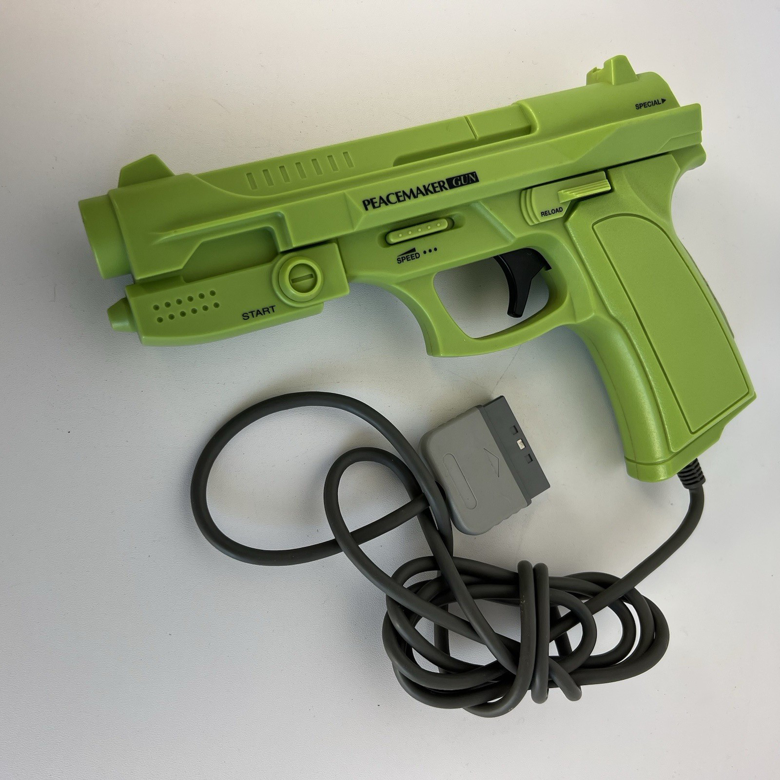 Nuby Peacemaker Light Gun Controller for Sony PlayStation 1 PS1 Green
