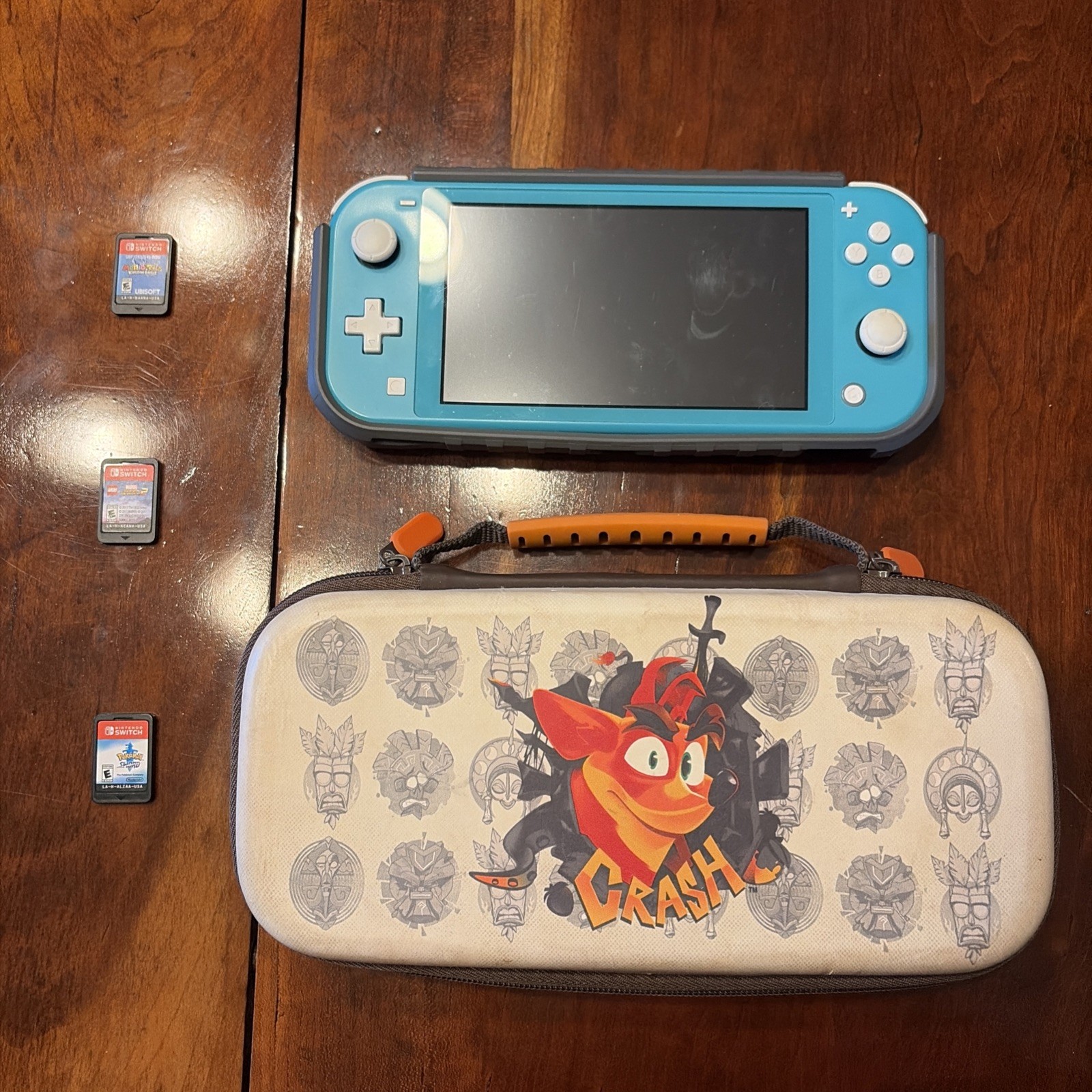Teal Nintendo switch lite bundle 160gb USED (Read Description!)