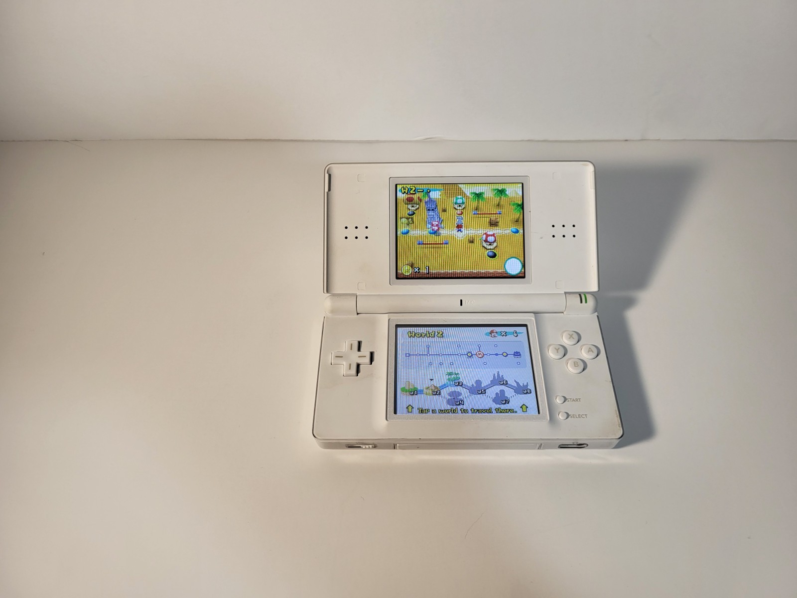 Nintendo DS Lite Handheld with Charger and Mario Bros USG-001 FULLY WORKING