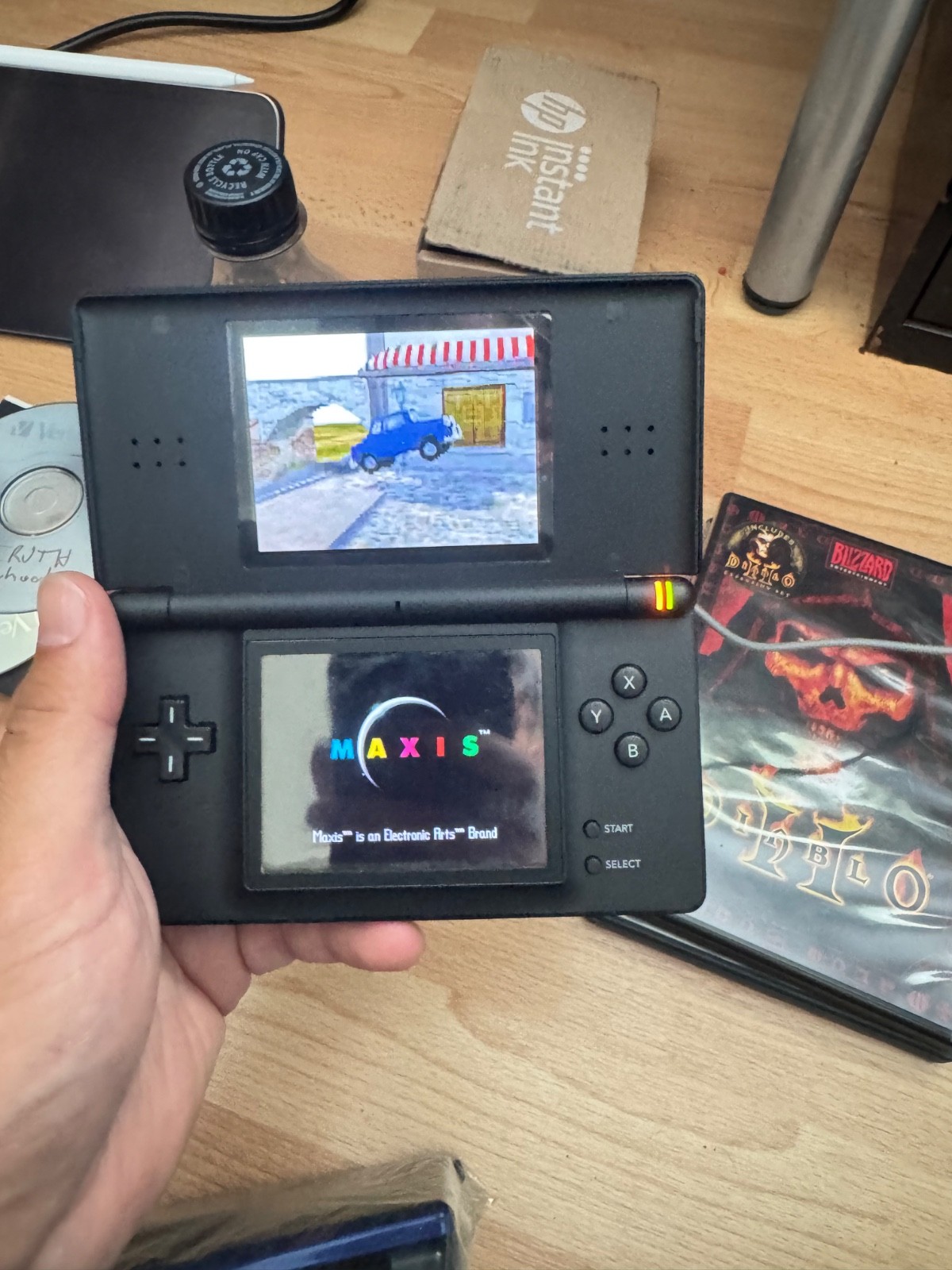 Nintendo DS Lite Handheld System – Onyx Black (working) and a Blue (for parts)