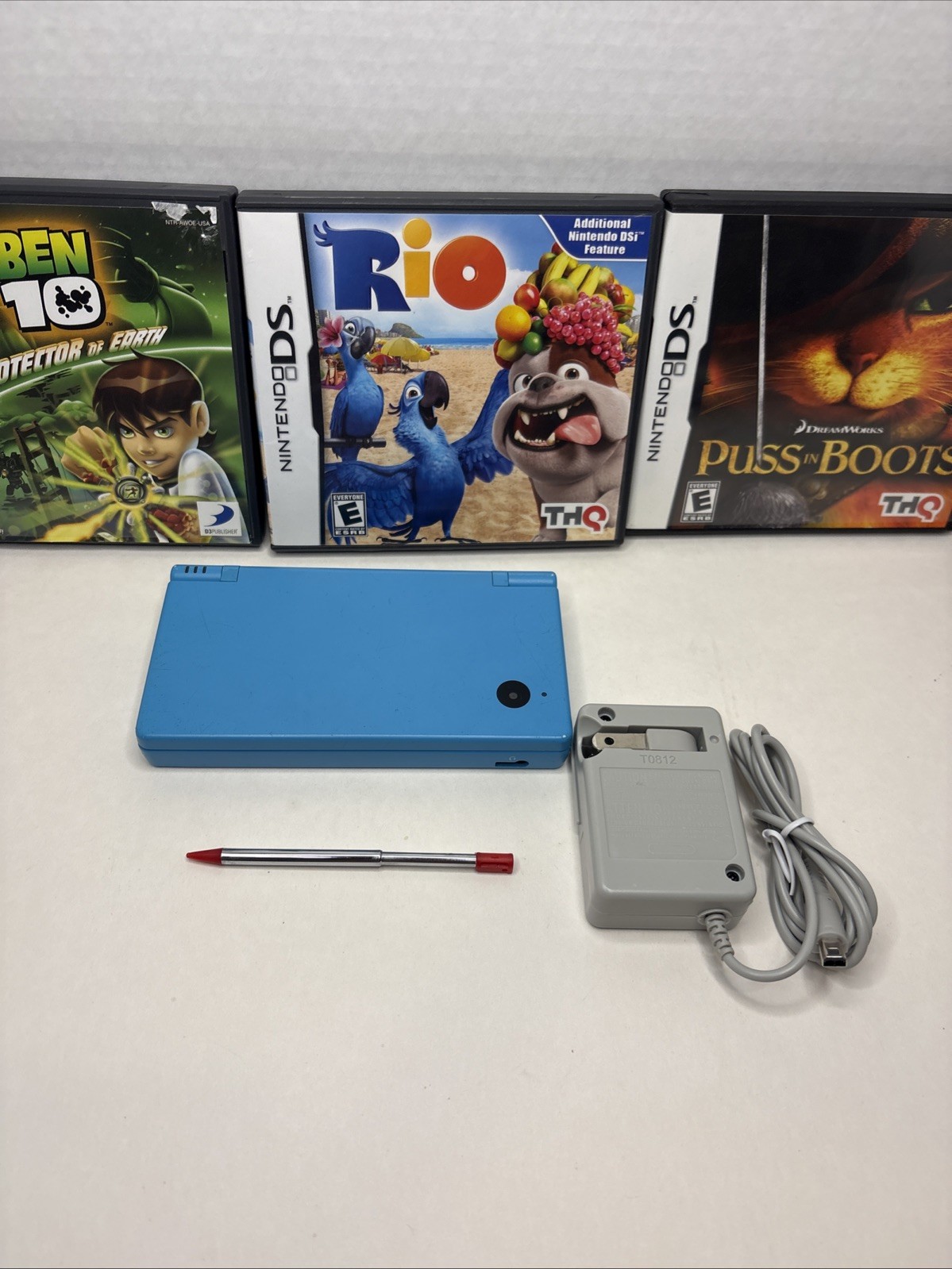 Nintendo DS Handheld System Blue with Aftermarket Charger, Stylus, And Game Lot!