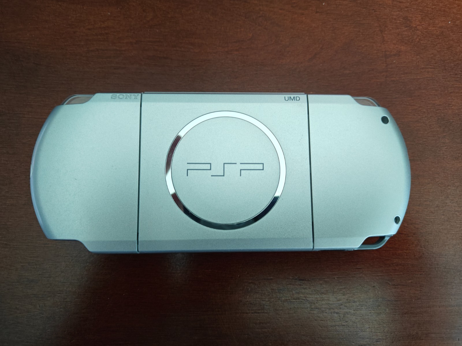 Sony PSP 1000 Silver Handheld System with Charger and Case