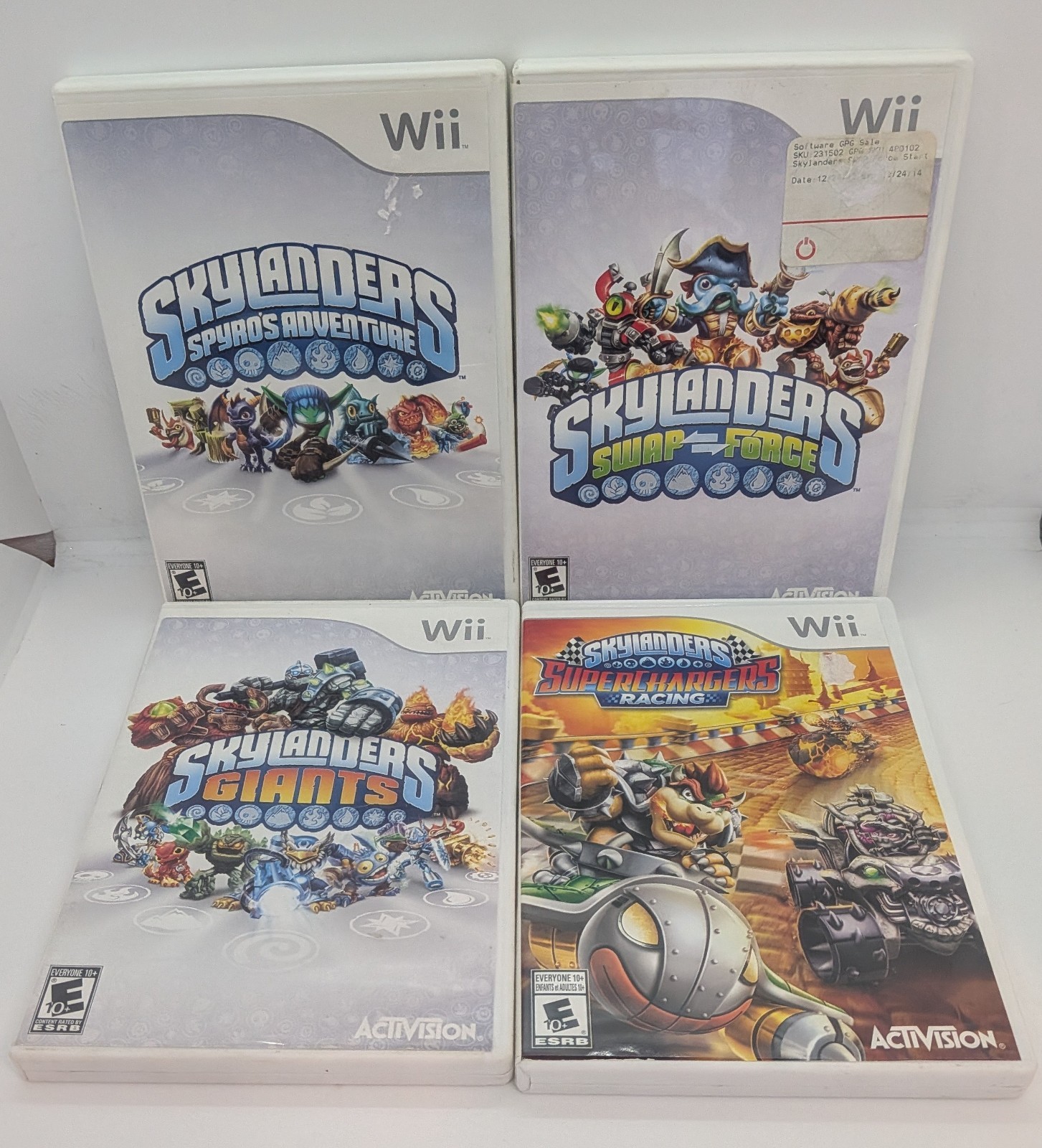 Lot of 4 Wii Skylanders Games Spyros Adventure, Giants, Superchargers,Swap Force