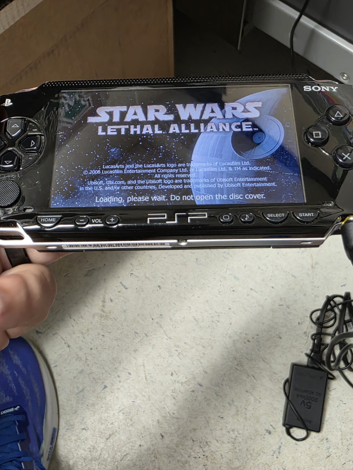 Sony PlayStation PSP 1001- Black W/Star Wars Lethal Alliance & Charger Tested