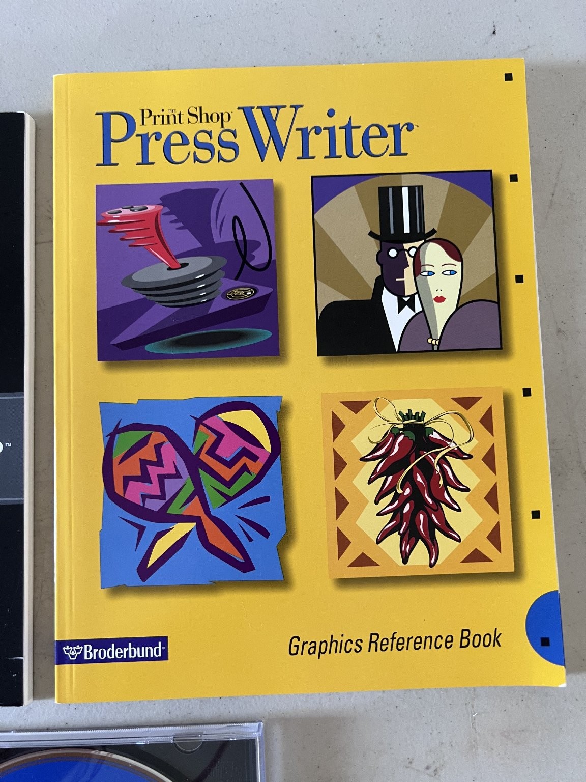 The Print Shop PressWriter Windows CD-ROM User’s Guide Graphics Book