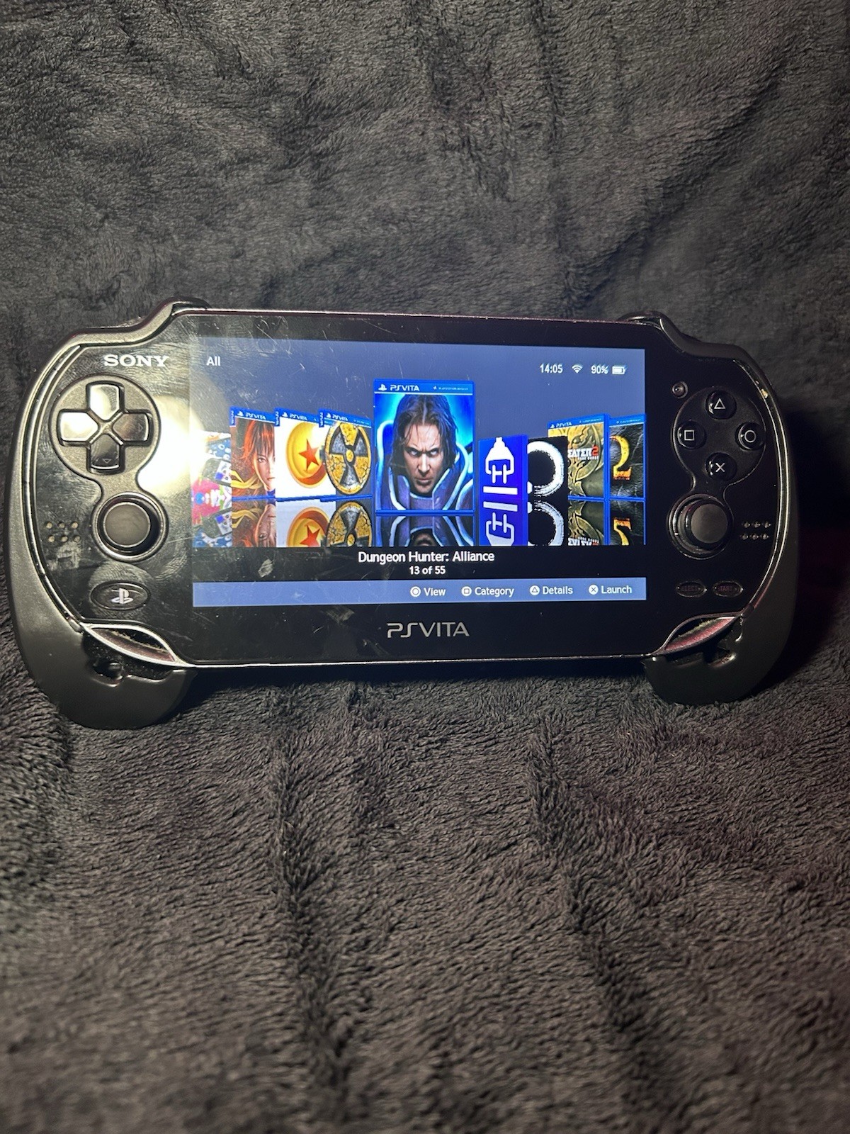 Sony PS Vita PCH-1000 Black 4GB Wi-Fi Handheld w/ Memory Card & Adapter