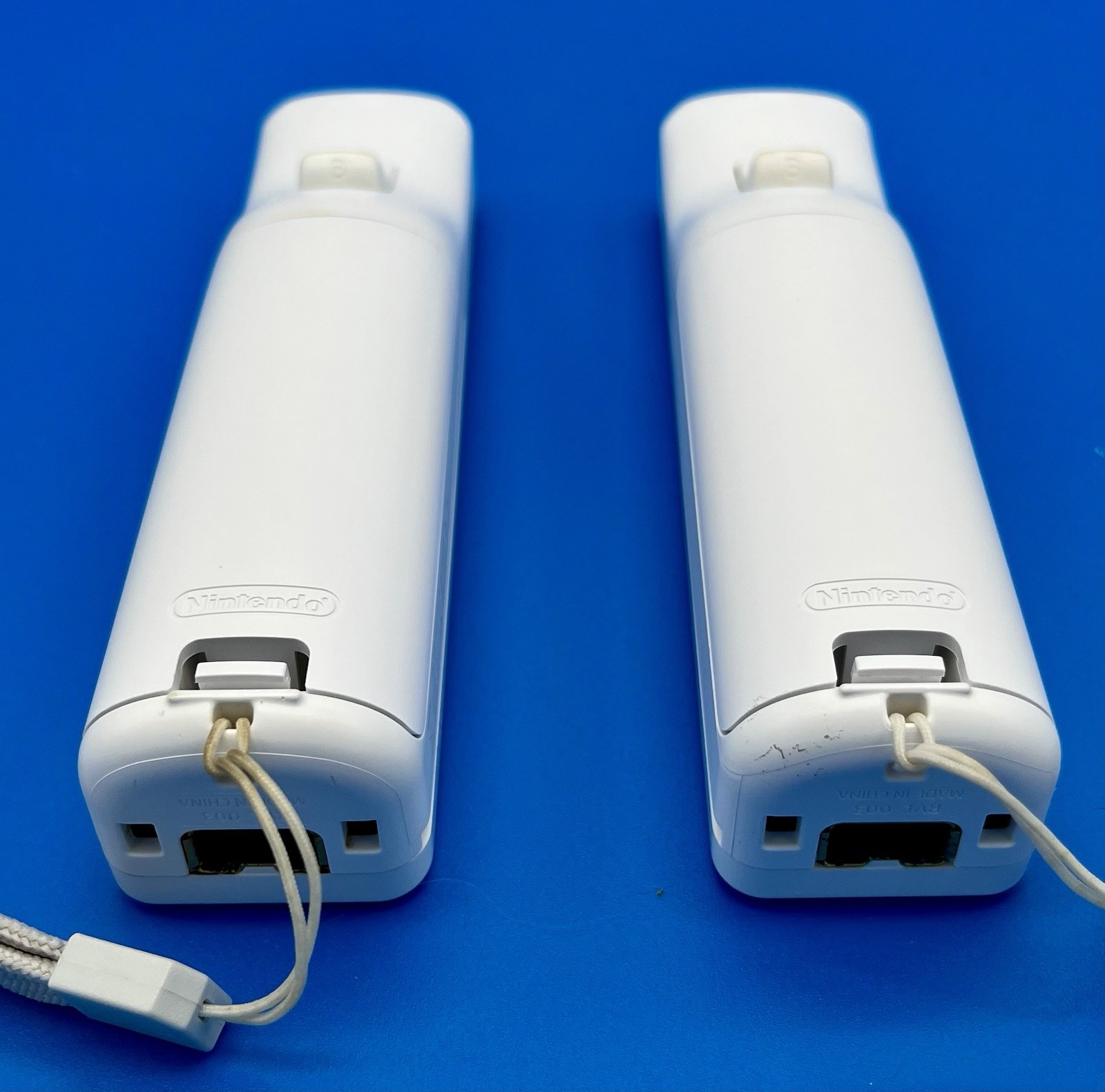 “Not Working”- Nintendo Wii White Remotes (2) with Straps & Sports Attachments