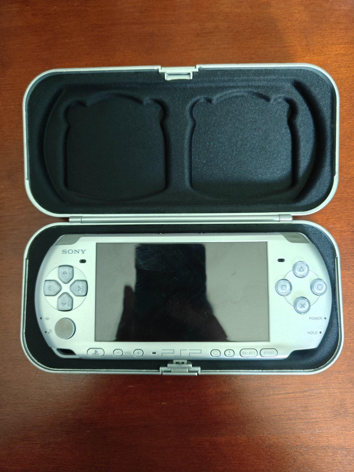 Sony PSP 1000 Silver Handheld System with Charger and Case