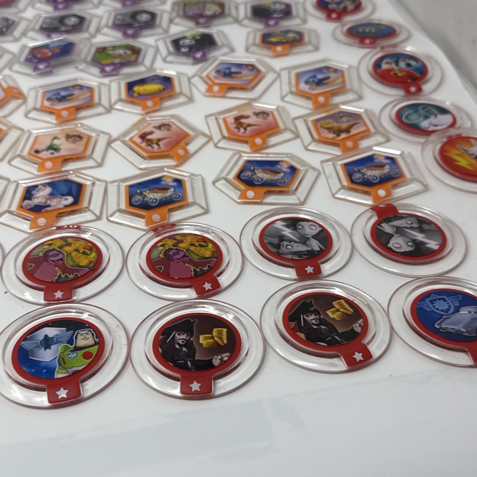Lot Of 110 DISNEY INFINITY 2.0 3.0 Stitch Bolt Frankenweenie Brave Power Disc