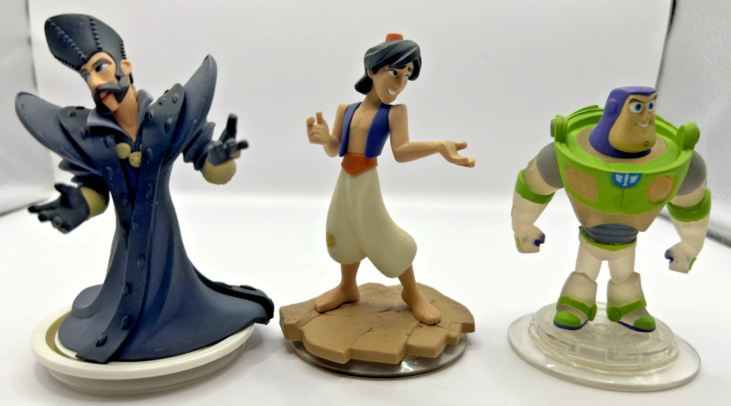 Disney Infinity lot of 50 figs & Pieces Star Wars Aladdin Cars Nemo venom Etc