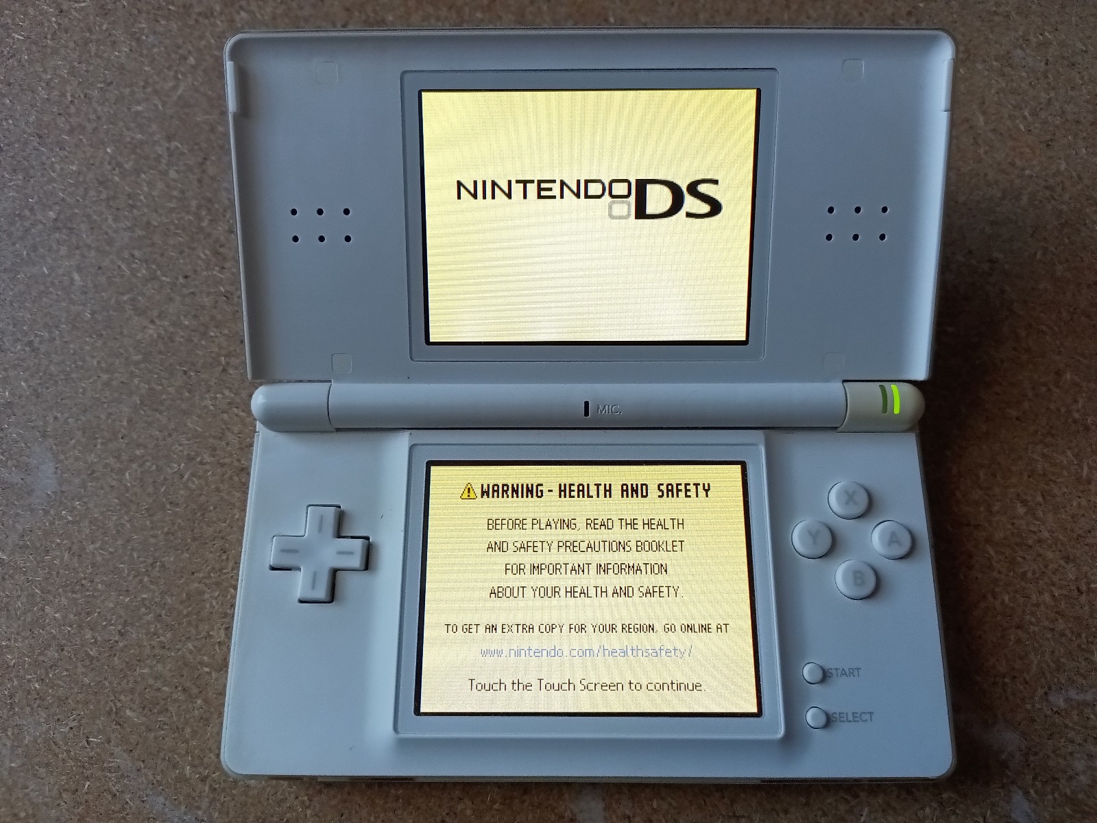 Nintendo DS Lite Handheld System White – 2 DS Games 1 GBA Game