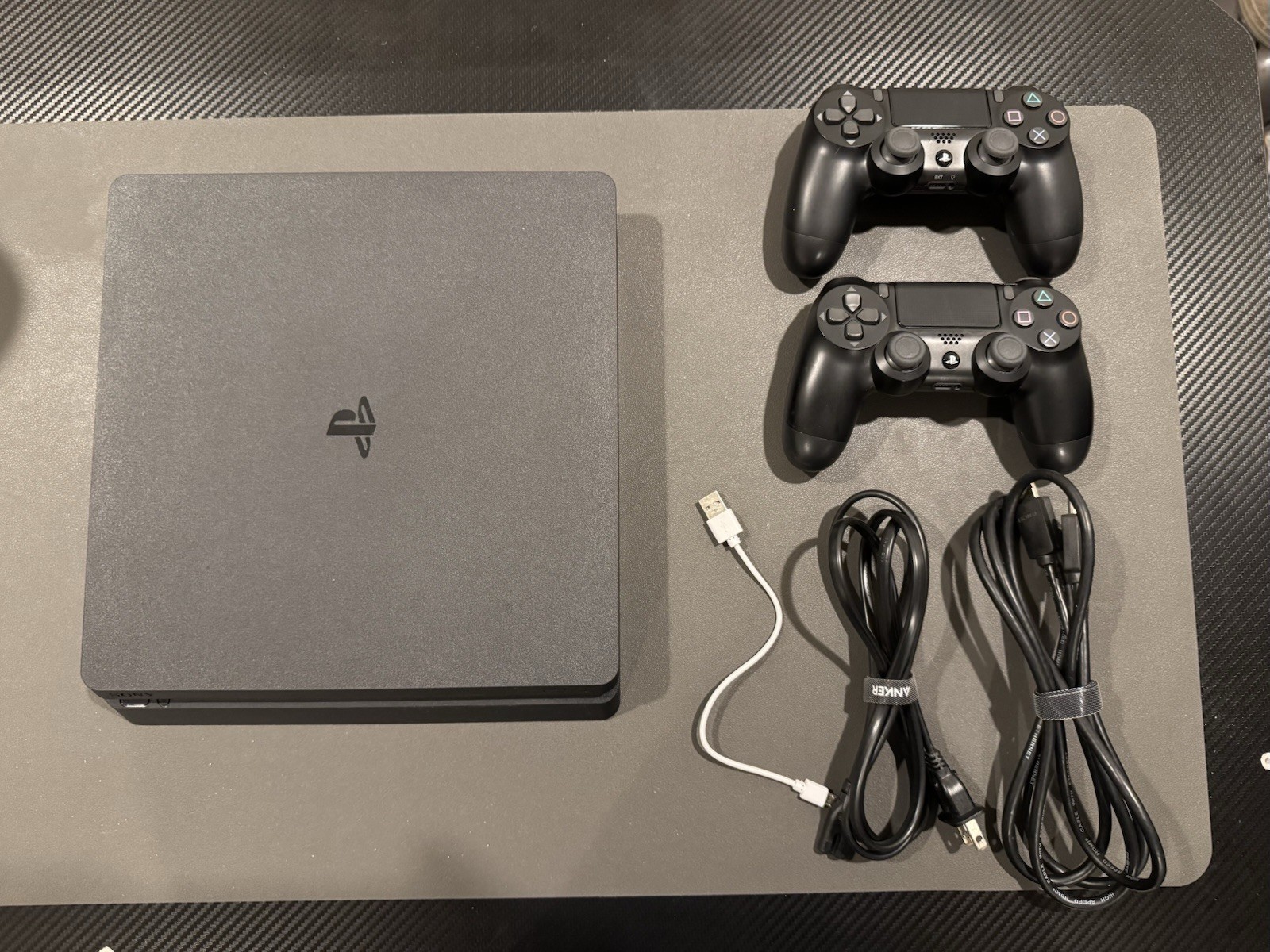 Sony PlayStation 4 Slim 1TB Black Console with 2 Controllers and Cables