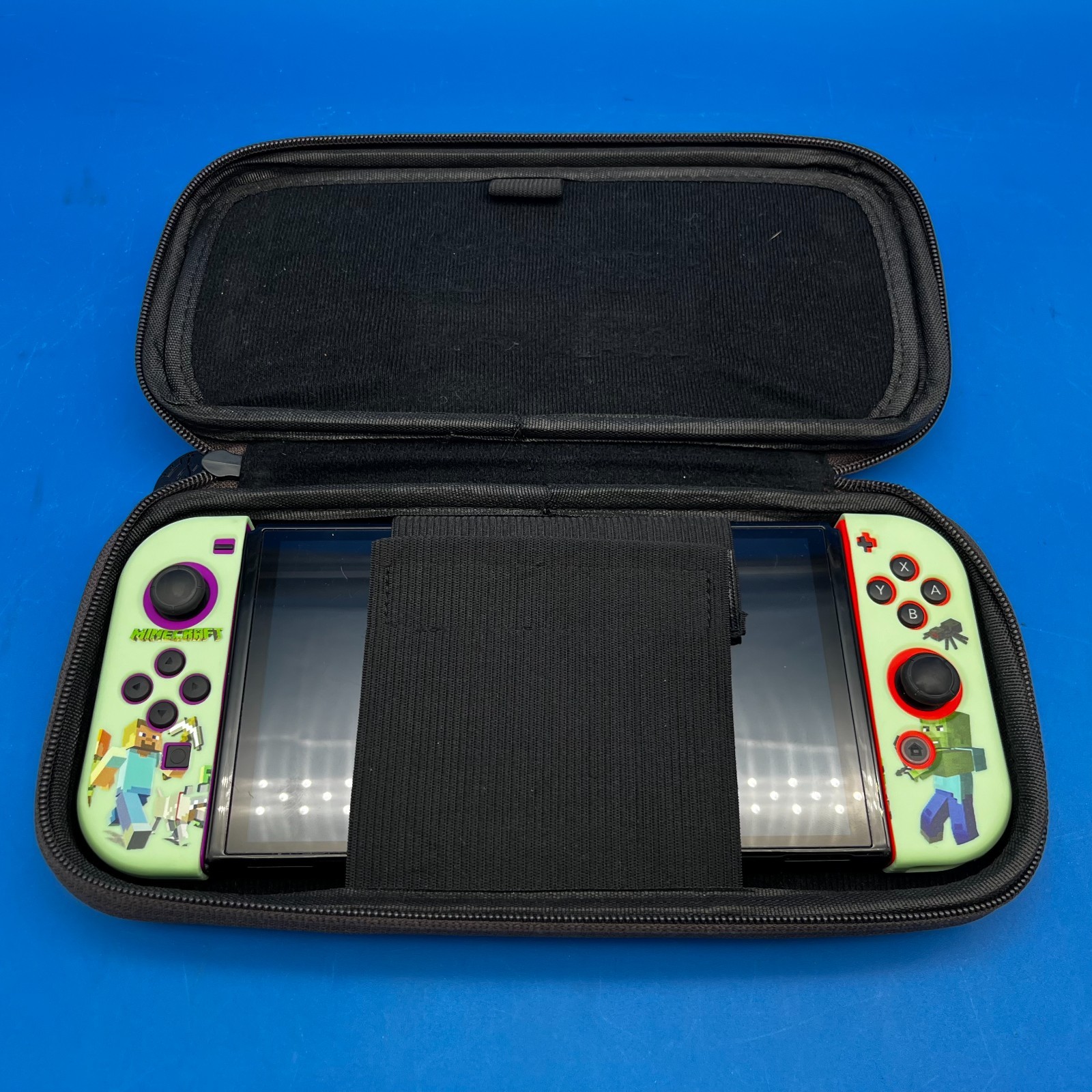 Nintendo Switch OLED Model HEG-001 Handheld Console – 64GB (Red/Purple Joy-Cons)