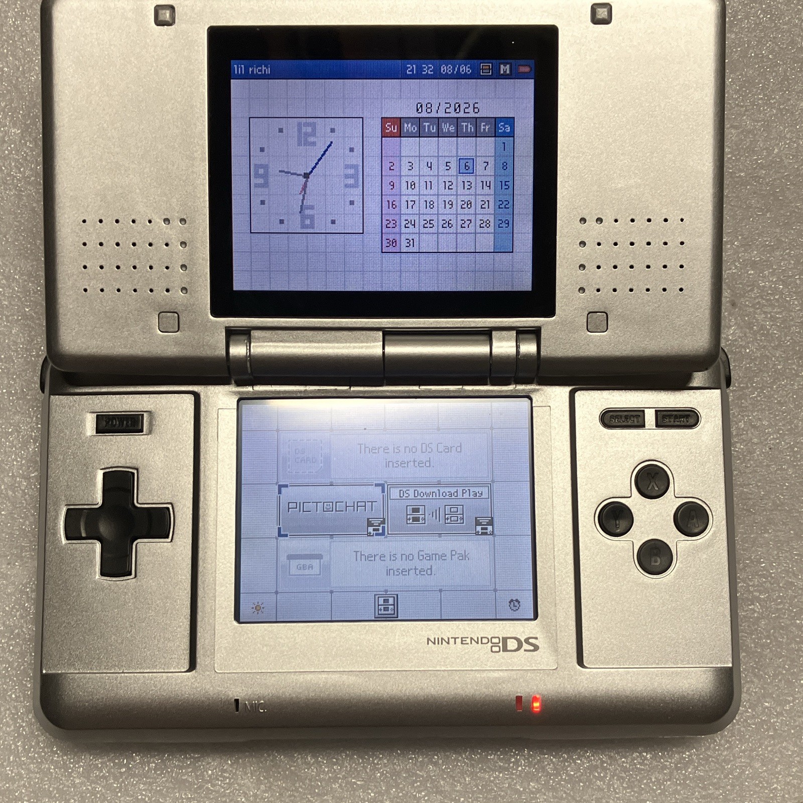 Nintendo DS Silver/Black Handheld Console as is no charger stylus or games