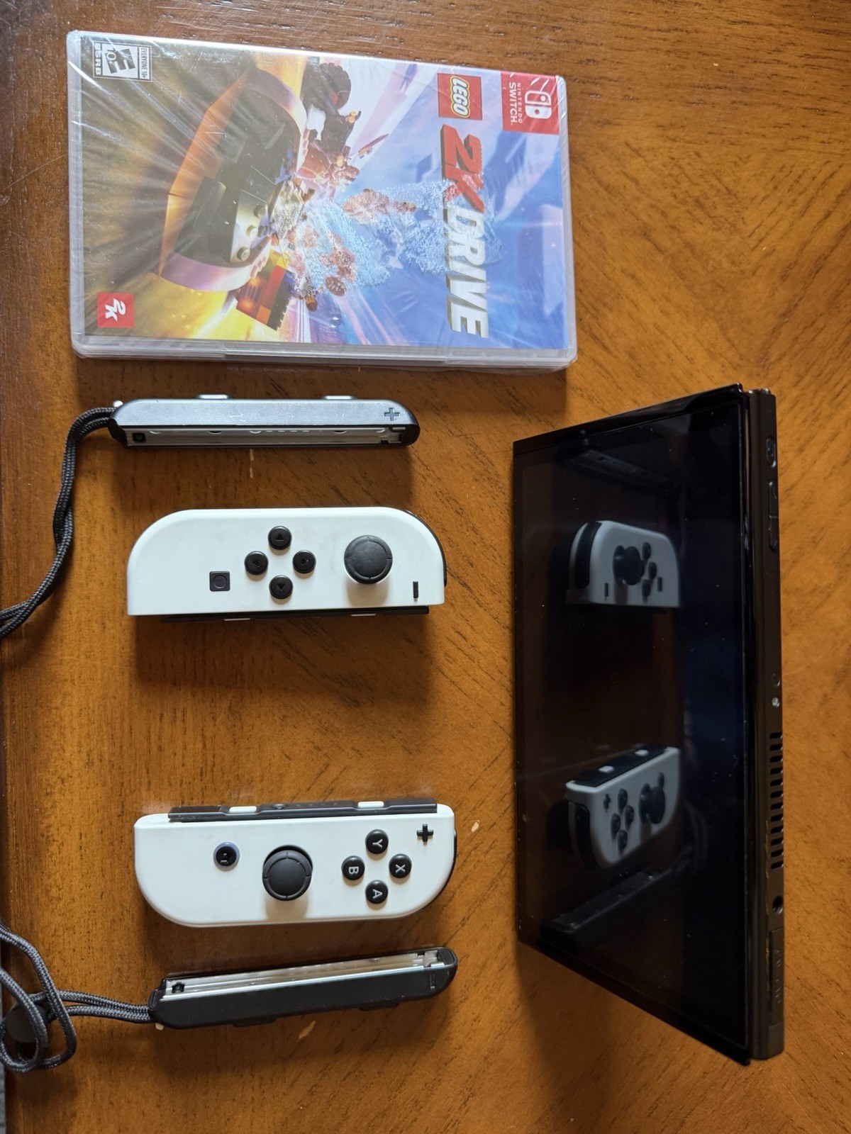 Nintendo OLED Switch 32GB Console w/ White Joy-Con & Grip, Wi-Fi USB-C