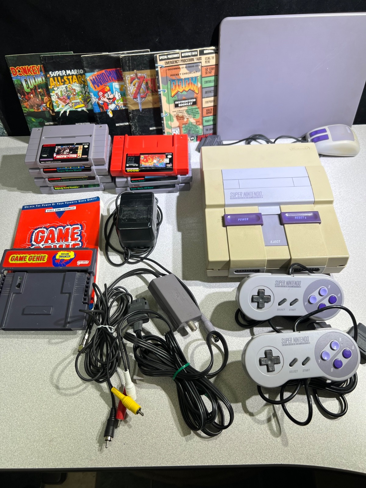 Super NES SNS-001 Console, Controllers, Paint Pad w/Mouse, Game Genie & 7 Games