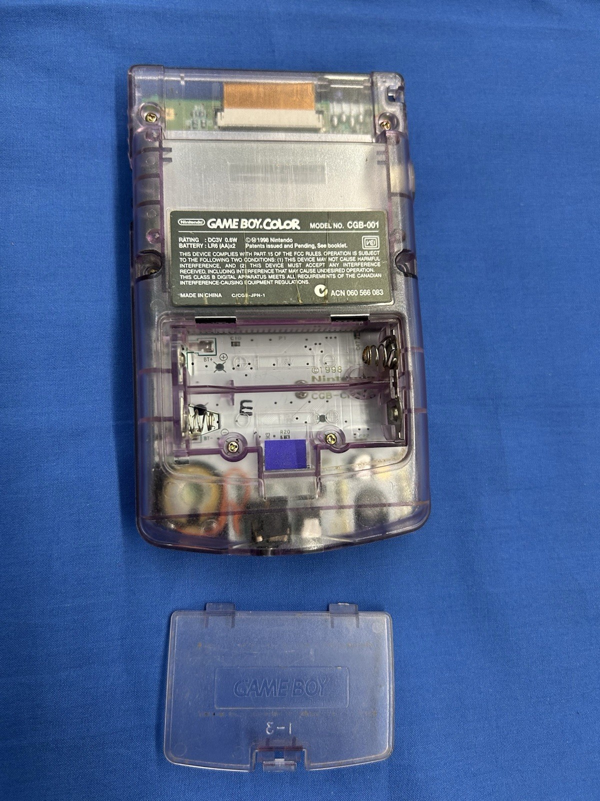 Nintendo Game Boy Color Handheld System – Atomic Purple CGB-001 Sticky Start