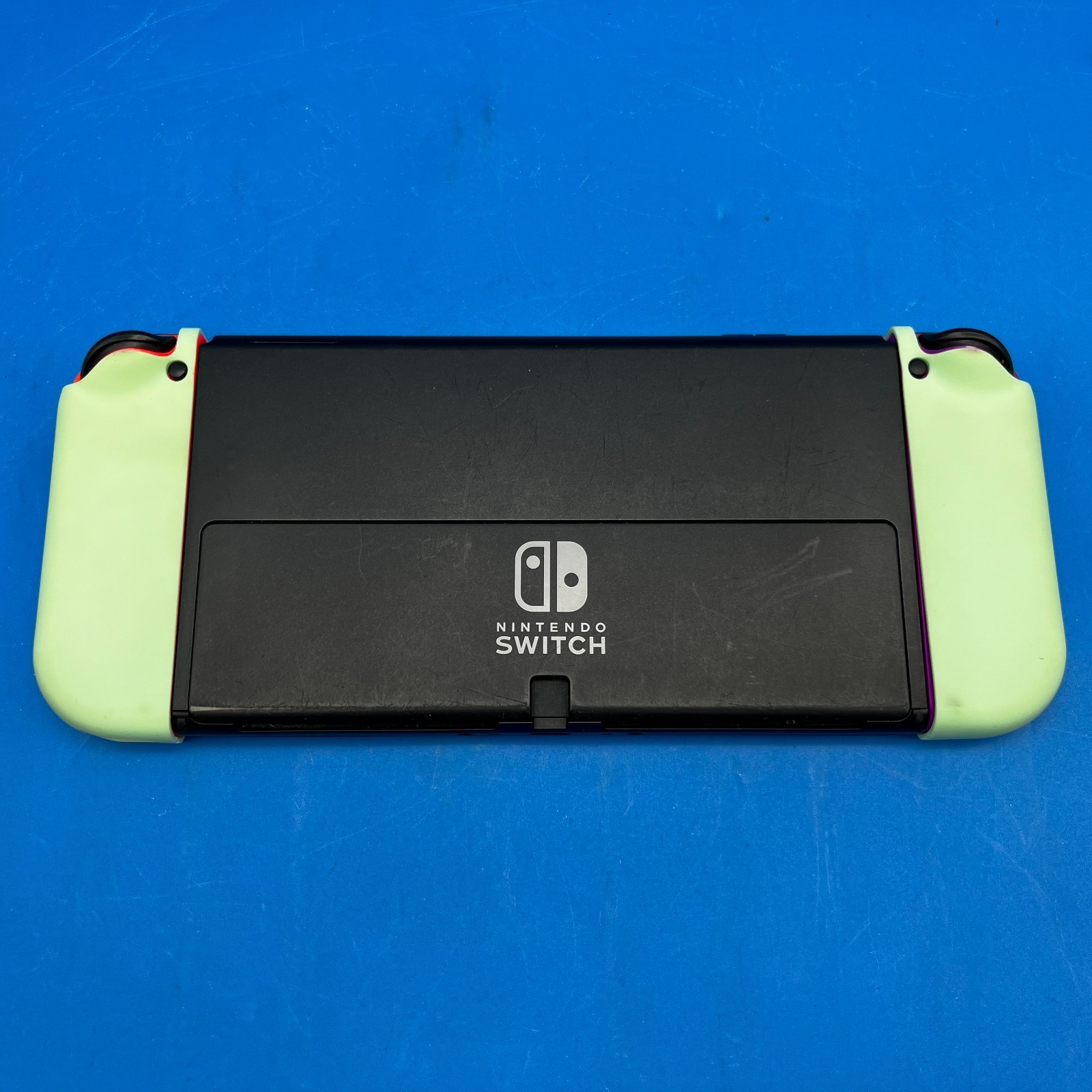 Nintendo Switch OLED Model HEG-001 Handheld Console – 64GB (Red/Purple Joy-Cons)
