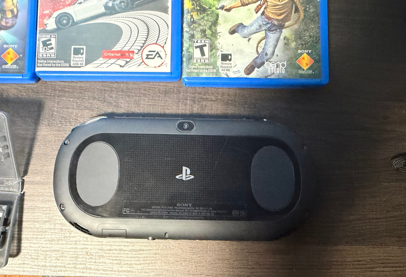 Sony PS Vita PCH-2001 Black Complete Bundle – Games, Memory Cards, Carrying Case