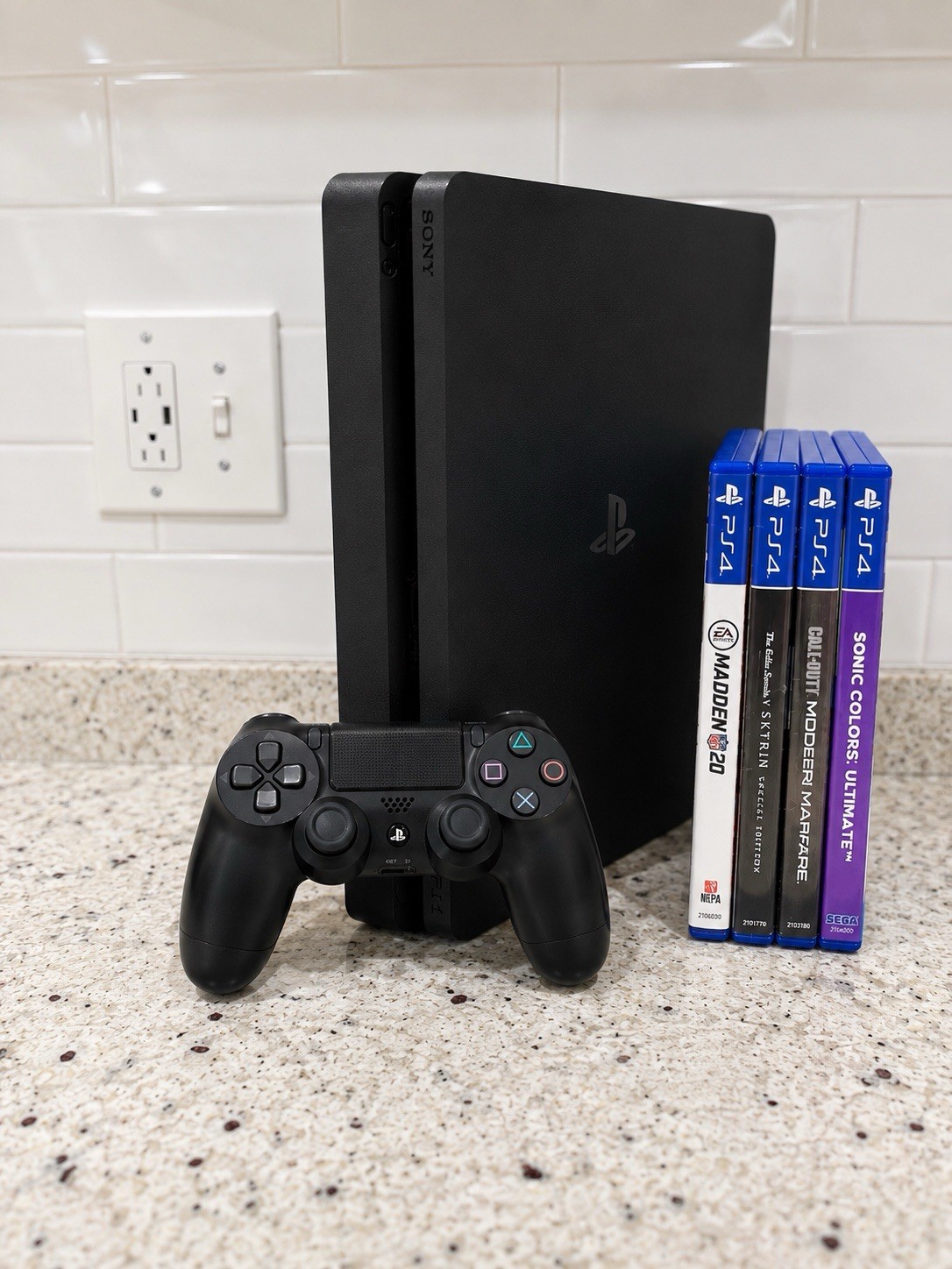 Sony PS4 Slim 4K Black Console w/ DualShock 4 + 4 Games Bundle