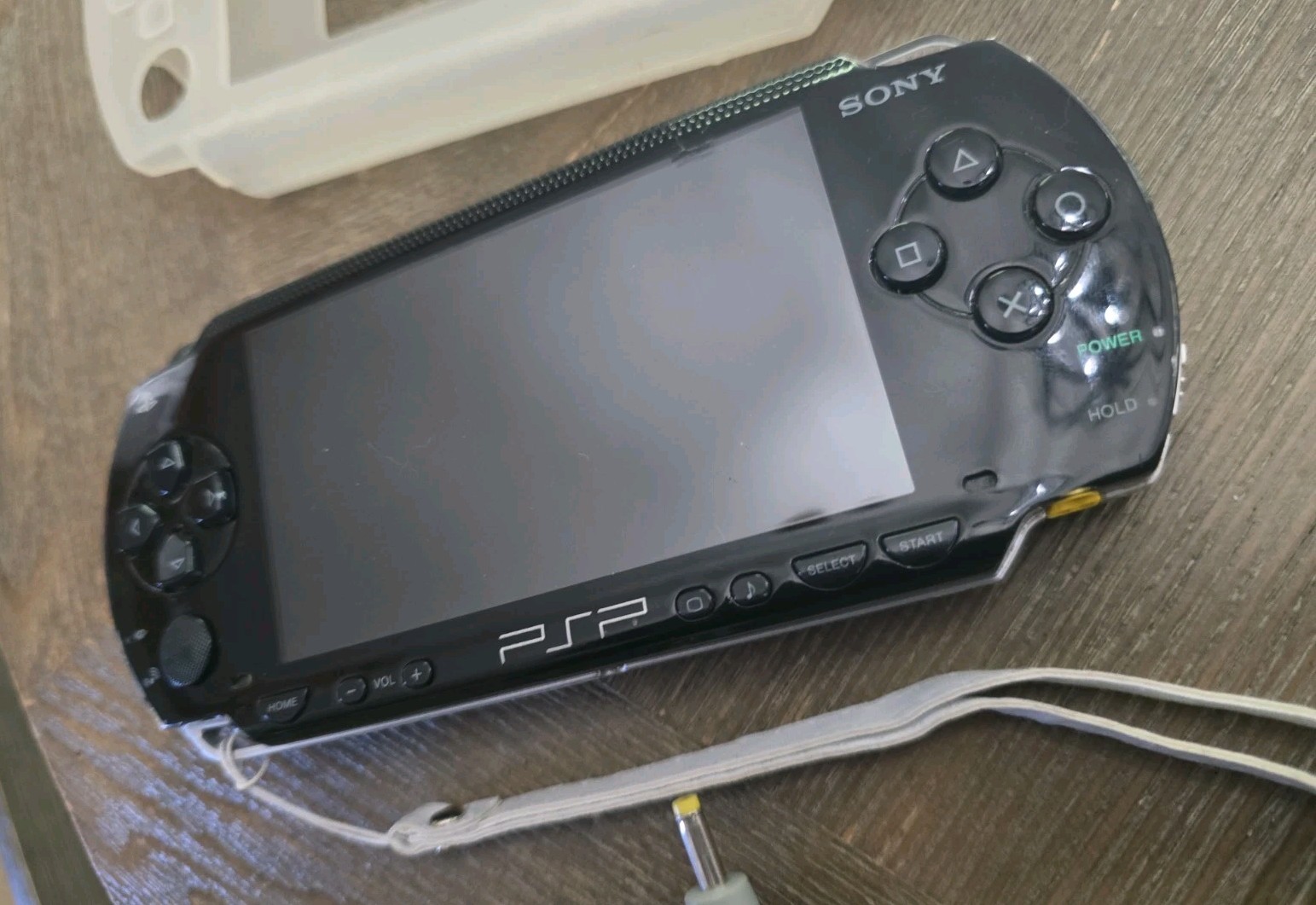 Sony PSP-1001 Black Handheld System, Charger, Memory Cards, And Cases. Read !!