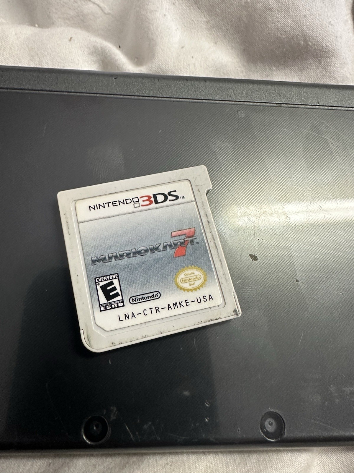 Nintendo “New”3DS XL Black System RED-001 W/ Charger , Mario Kart 7 & Carry Case