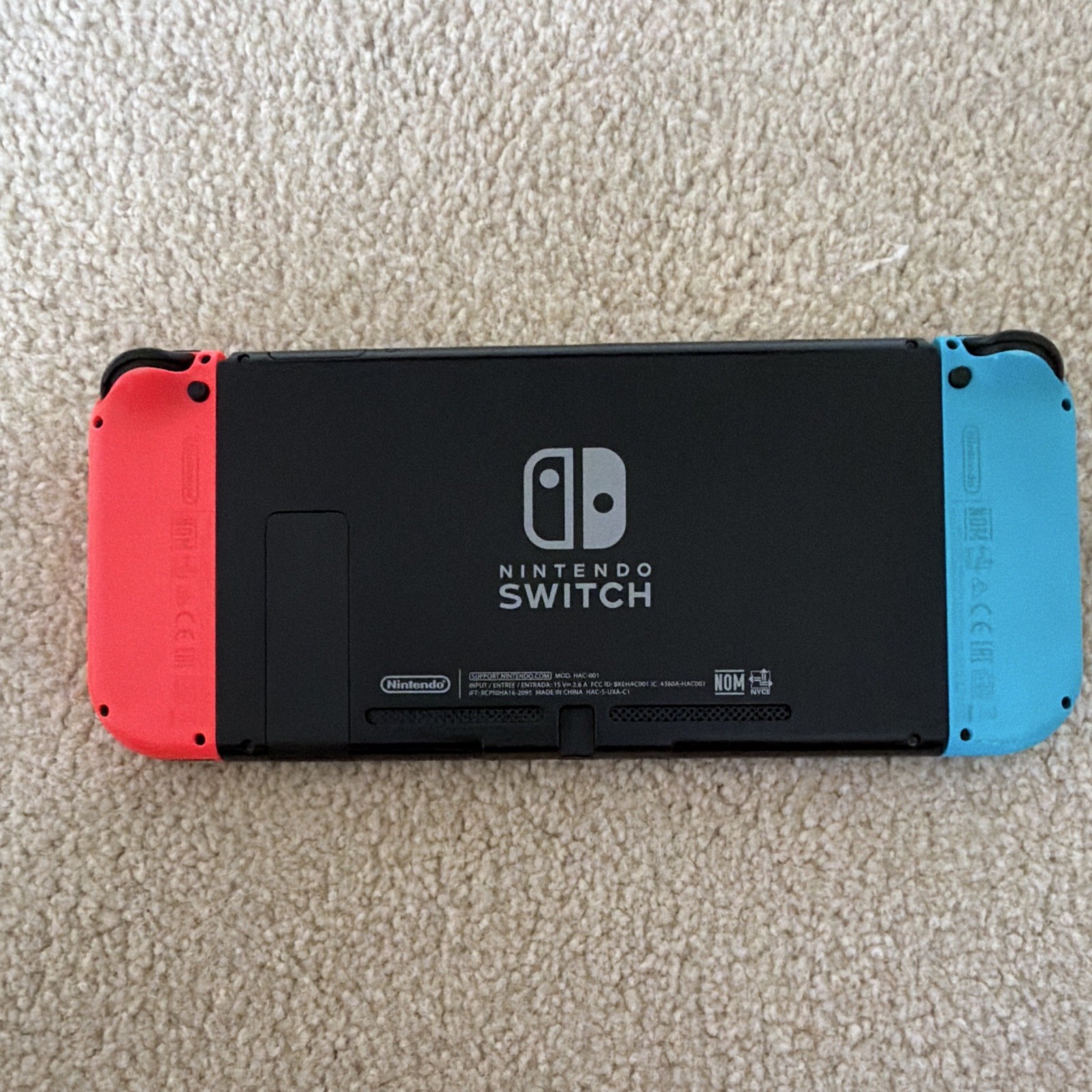 Nintendo Switch Console Neon Red/Blue w/ Smash Ultimate, Zelda BOTW & Case