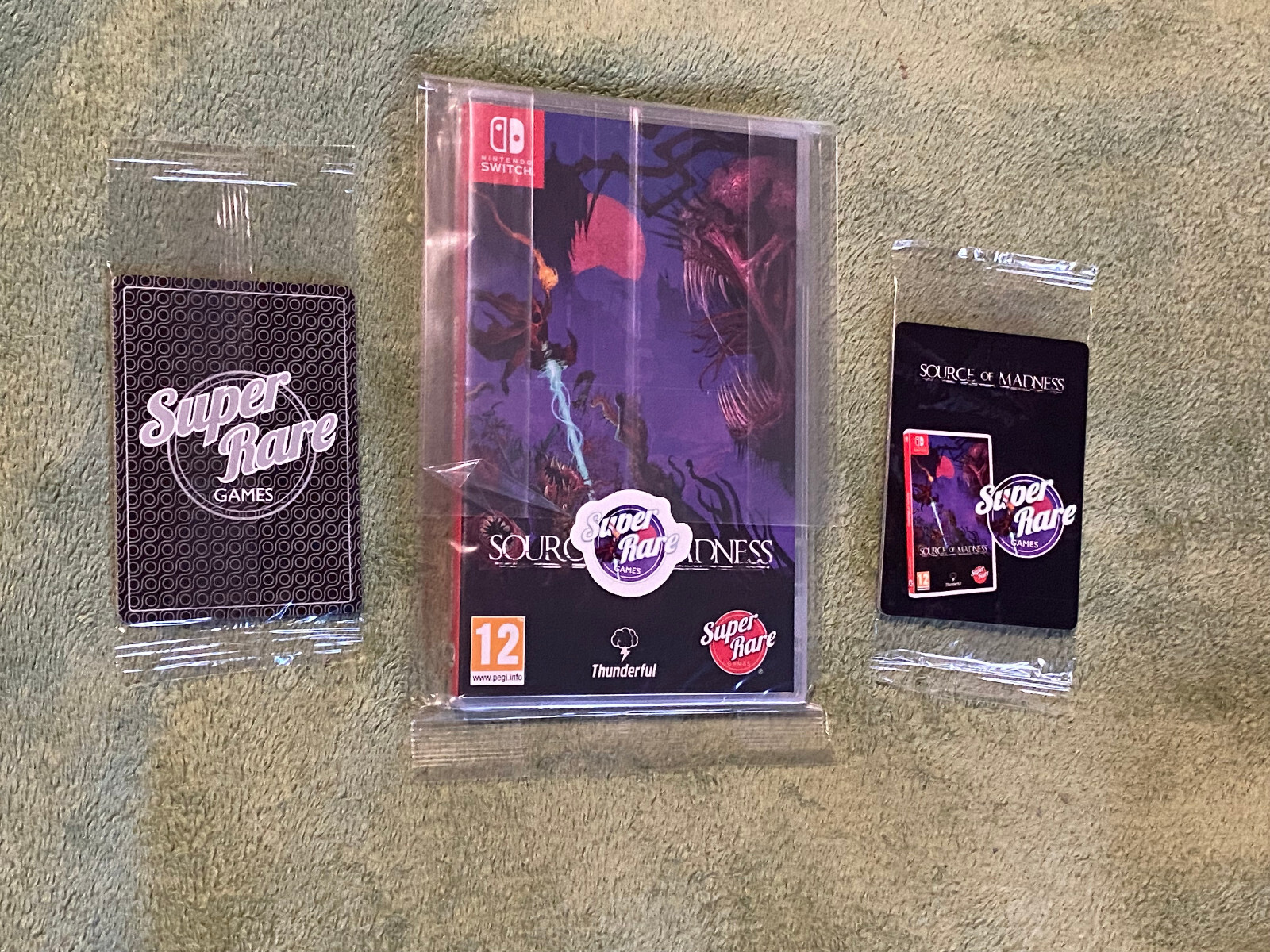 New Source Of Madness Nintendo Switch +2 card booster packs Super Rare Games #82