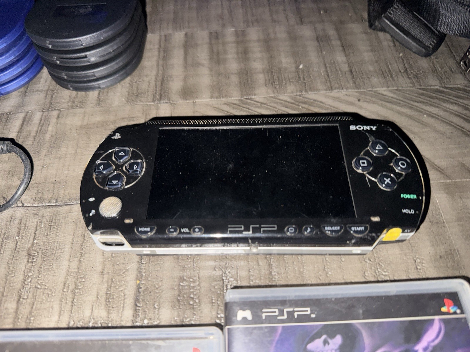 Sony PSP-1001 Handheld Console Bundle w/ Charger, MadCatz Case, 3 Games. Tested